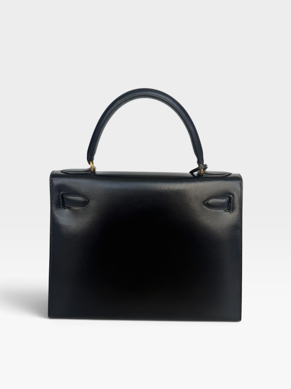 Hermès Vintage Kelly 28 In Navy Sellier Box Leather With Gold Hardware. 100% authentic and preloved in excellent condition.