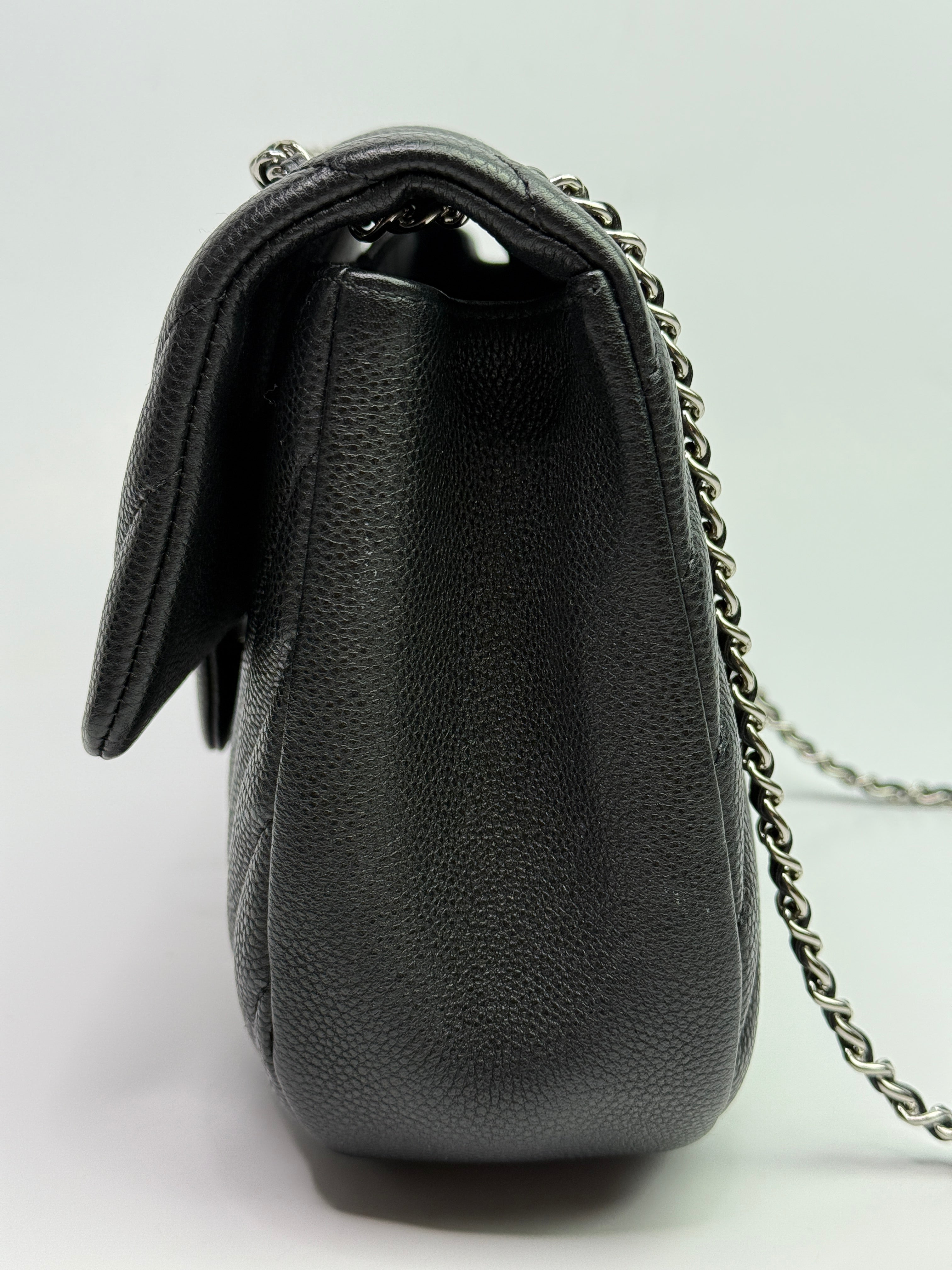 Chanel Seasonal Flap Bag In Black Chevron Caviar Leather With SHW