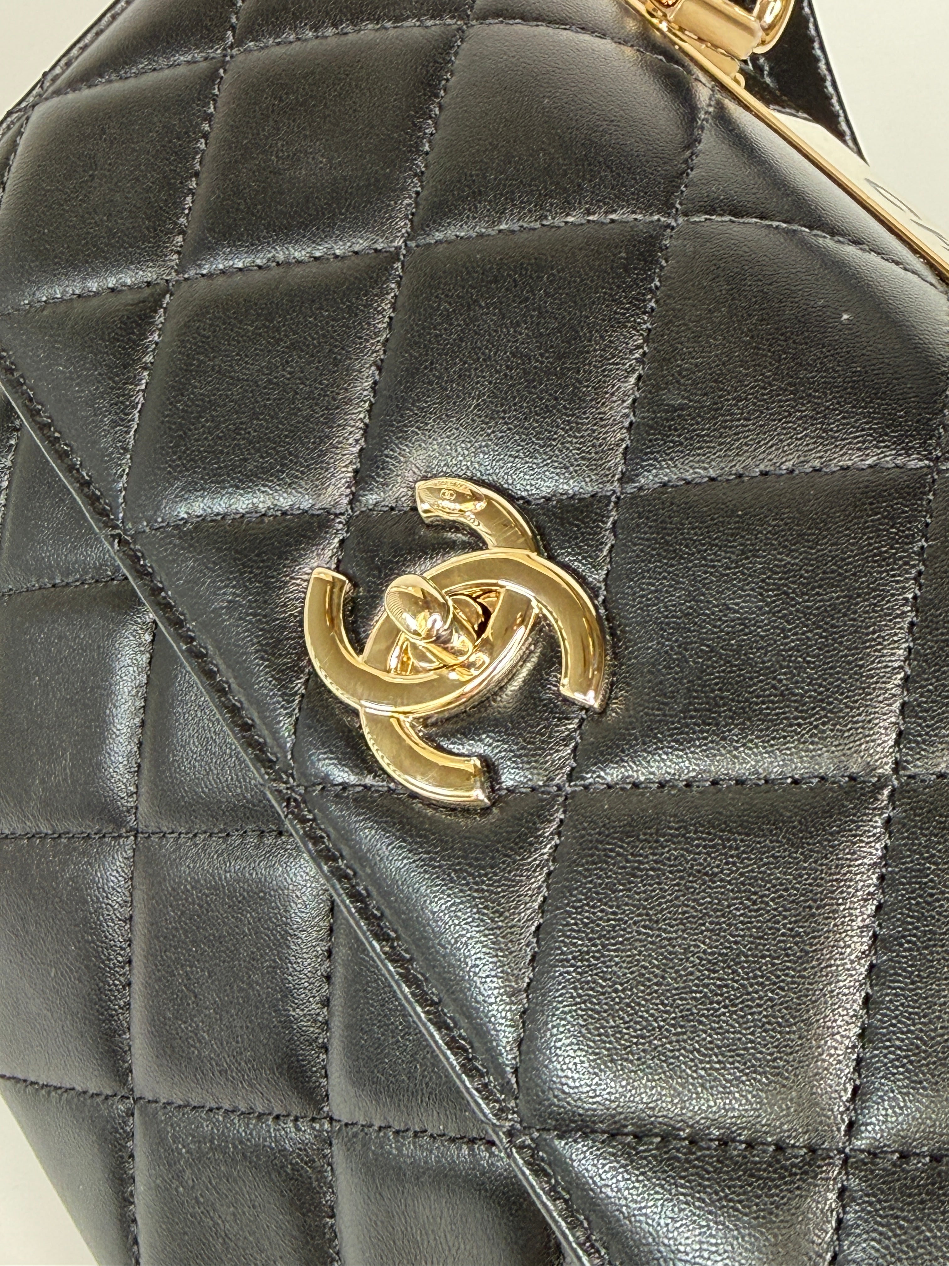 Authentic and preloved Chanel Trendy Top Handle Flap Bag In Black Lambskin With Gold Hardware. Excellent condition. 100% Authenticity guarantee