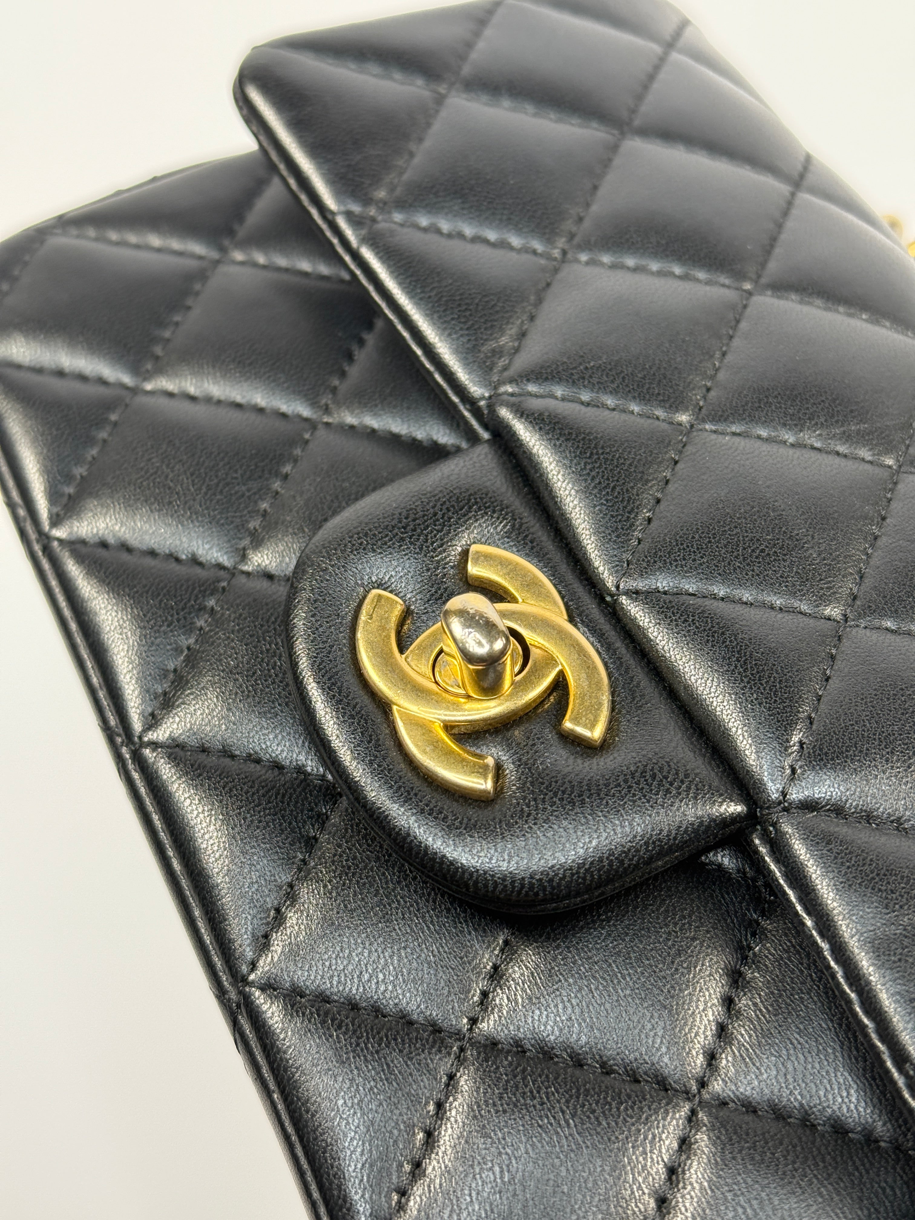 Chanel Mini Rectangle Top Handle Flap Bag In Black Lambskin With Gold Hardware
Pre Loved & Authentic