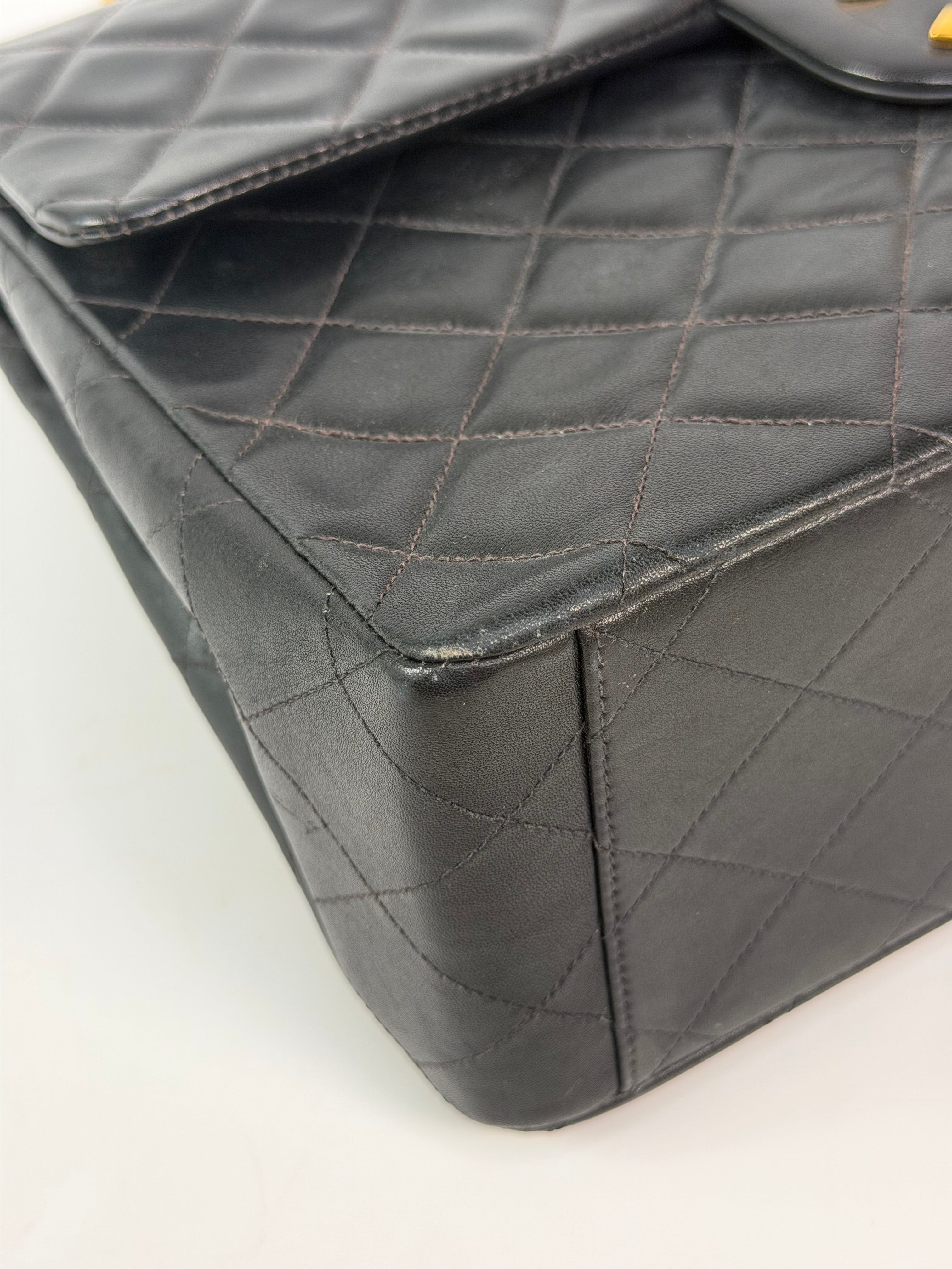 Chanel Vintage XL Maxi Flap Bag In Black Lambskin Gold Hardware. 100% authentic and preloved in excellent condition