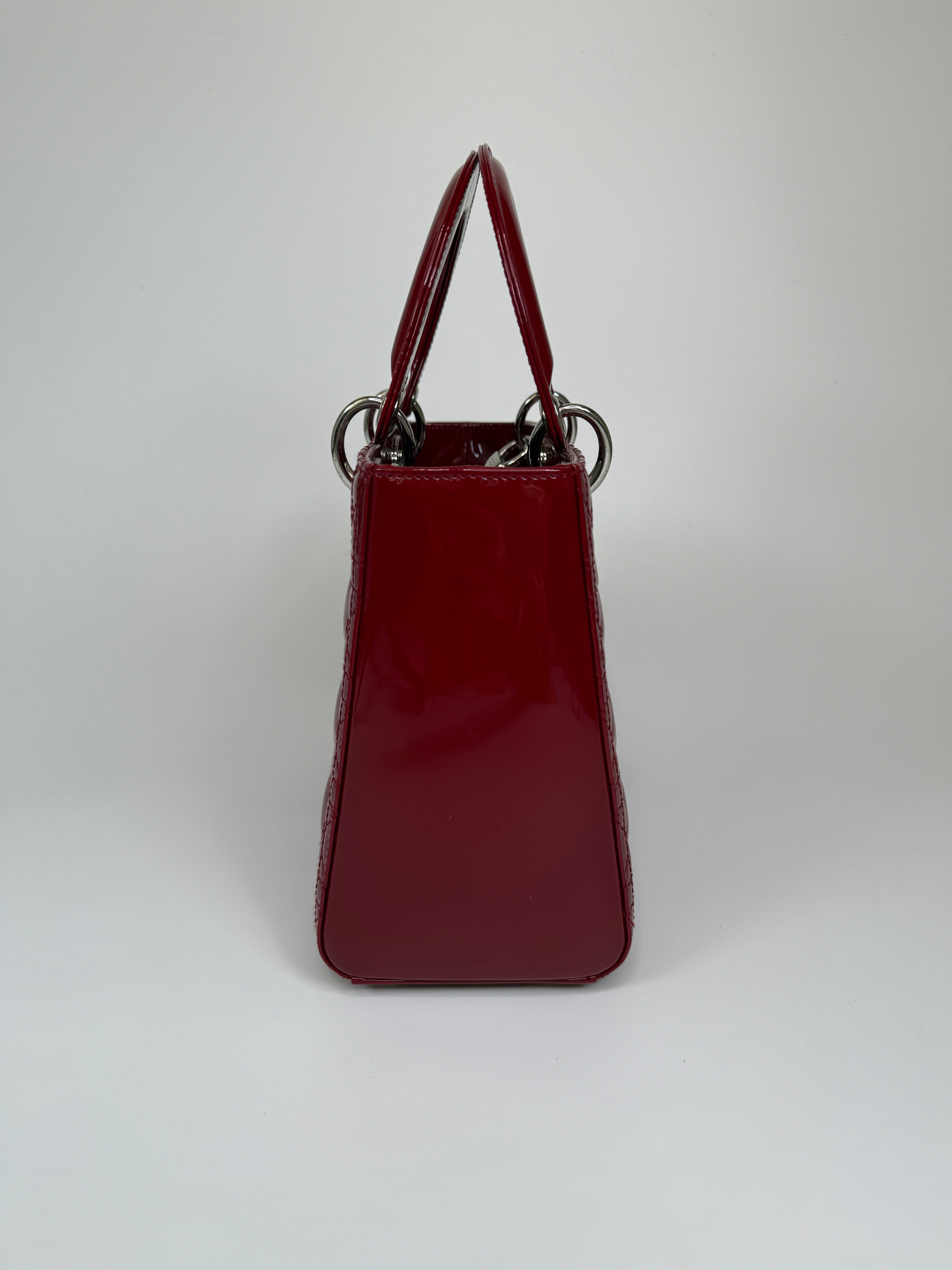 Christian Dior Medium Lady Dior In Patent Red Leather With Silver Hardware Authentic and preloved. 100% Authenticity Guarantee