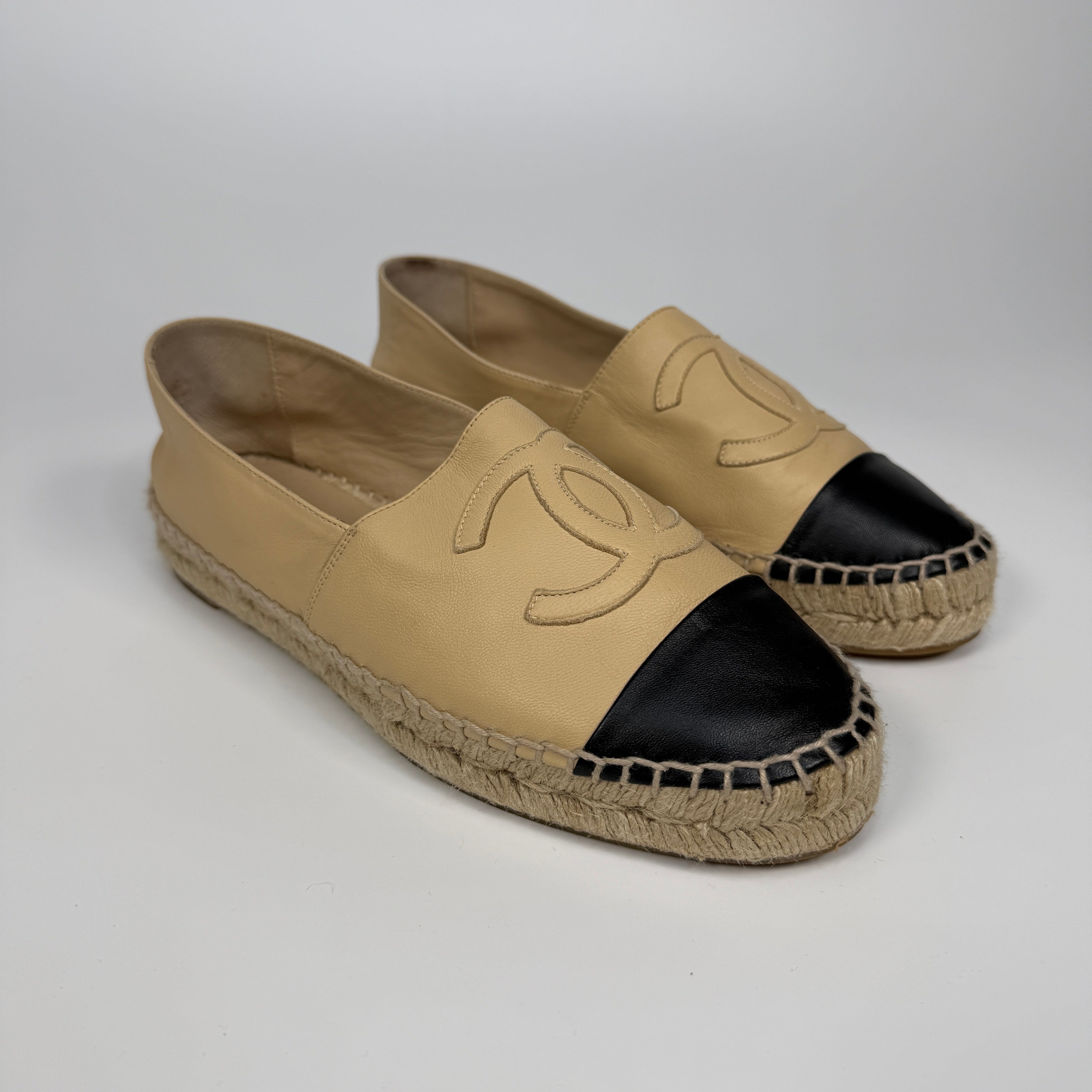 Authentic and preloved Chanel Espadrilles (Size 38/UK5) In Beige and Black Lambskin Leather. Excellent condition. 100% Authenticity guarantee