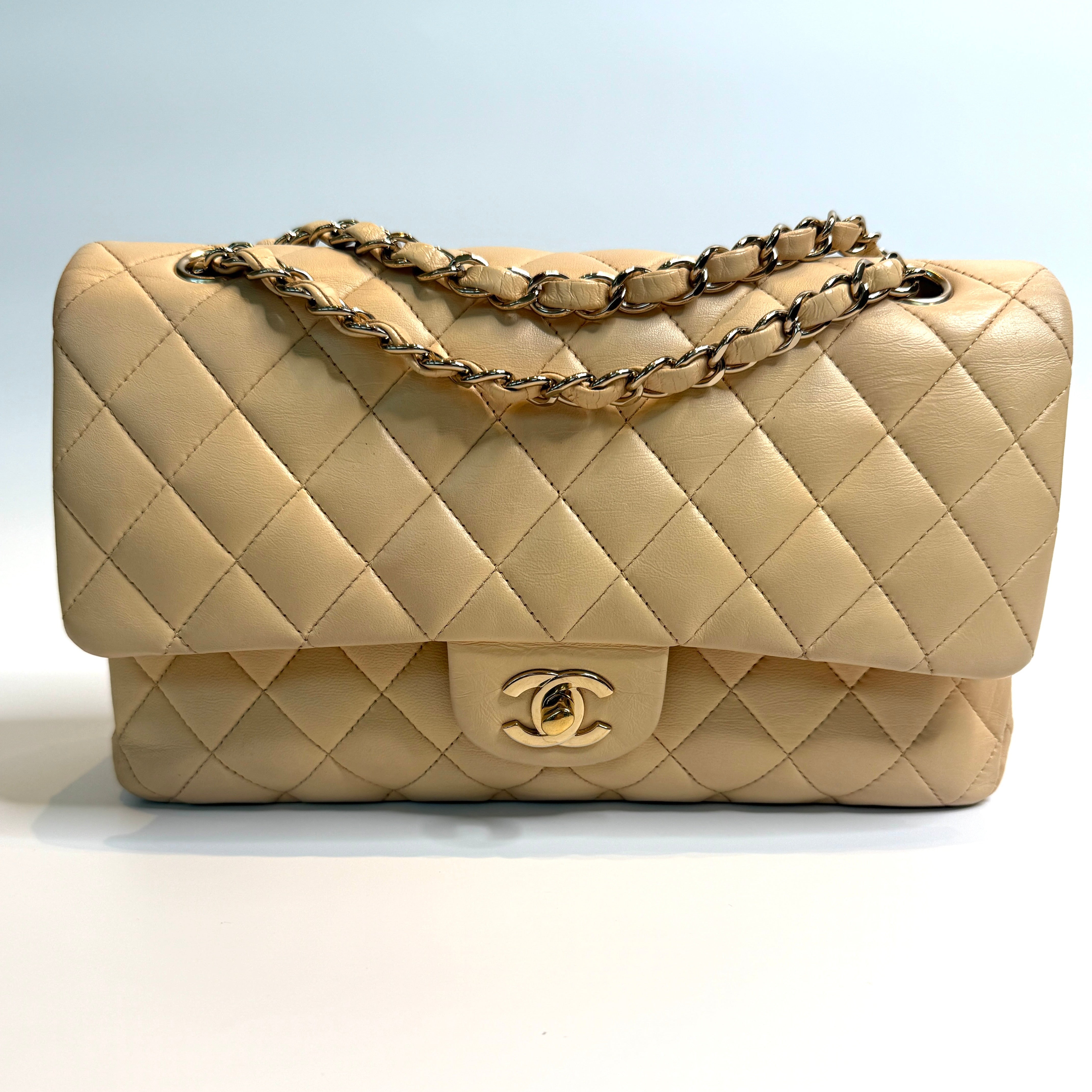 Chanel Medium Classic Double Flap Beige Lambskin Leather With Gold Hardware
Pre Loved & Authentic