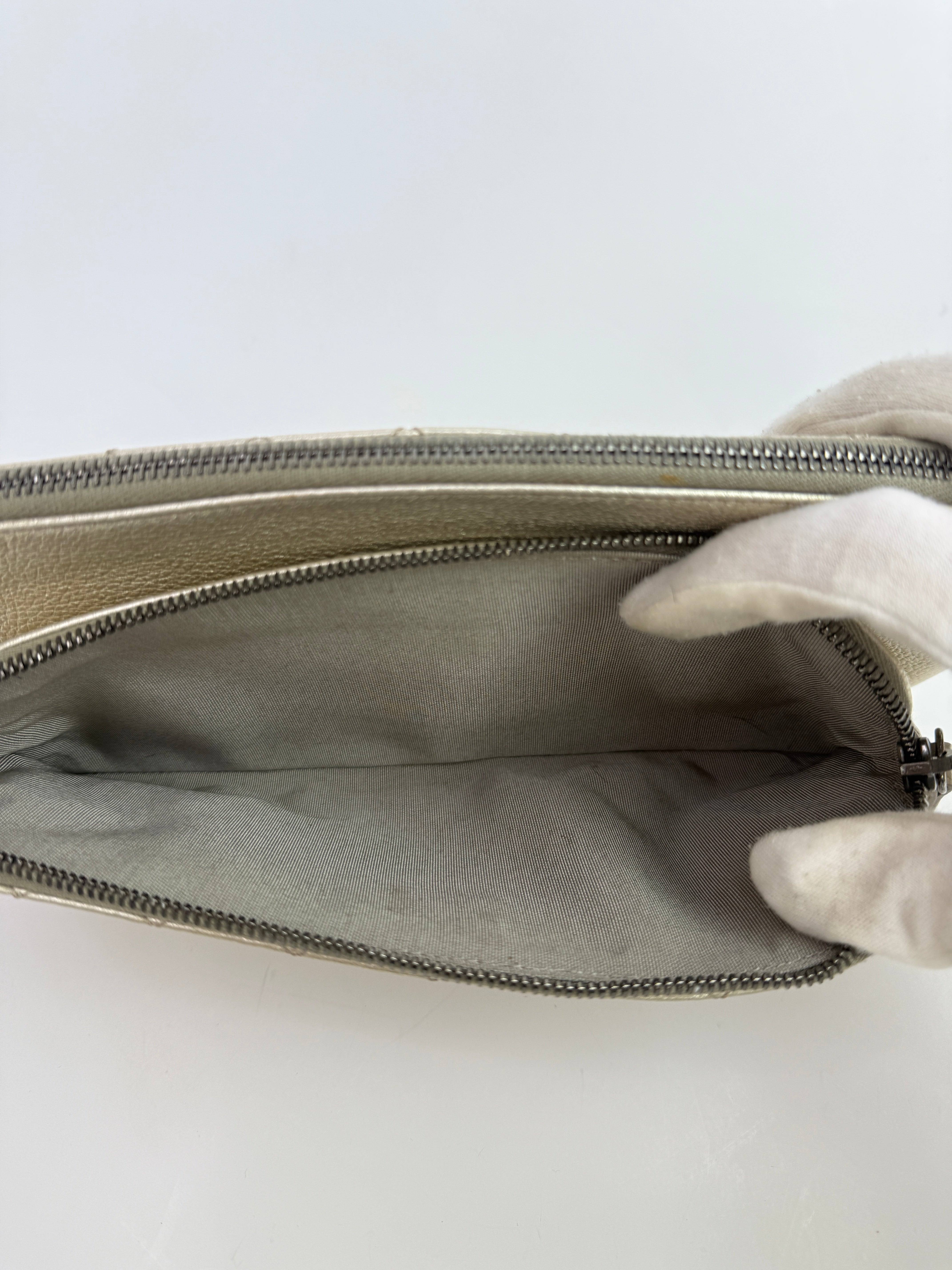 Chanel Clutch In Metallic Gold Calfskin Leather With Ruthenium Hardware
Pre Loved & Authentic