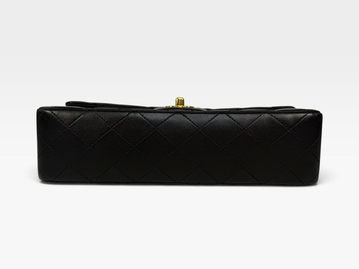 Chanel Medium Classic Double Flap In Black Lambskin Leather With Gold Hardware. 100% authentic and preloved in excellent condition