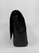Chanel Maxi Classic Double Flap In Black Caviar Leather With GHW