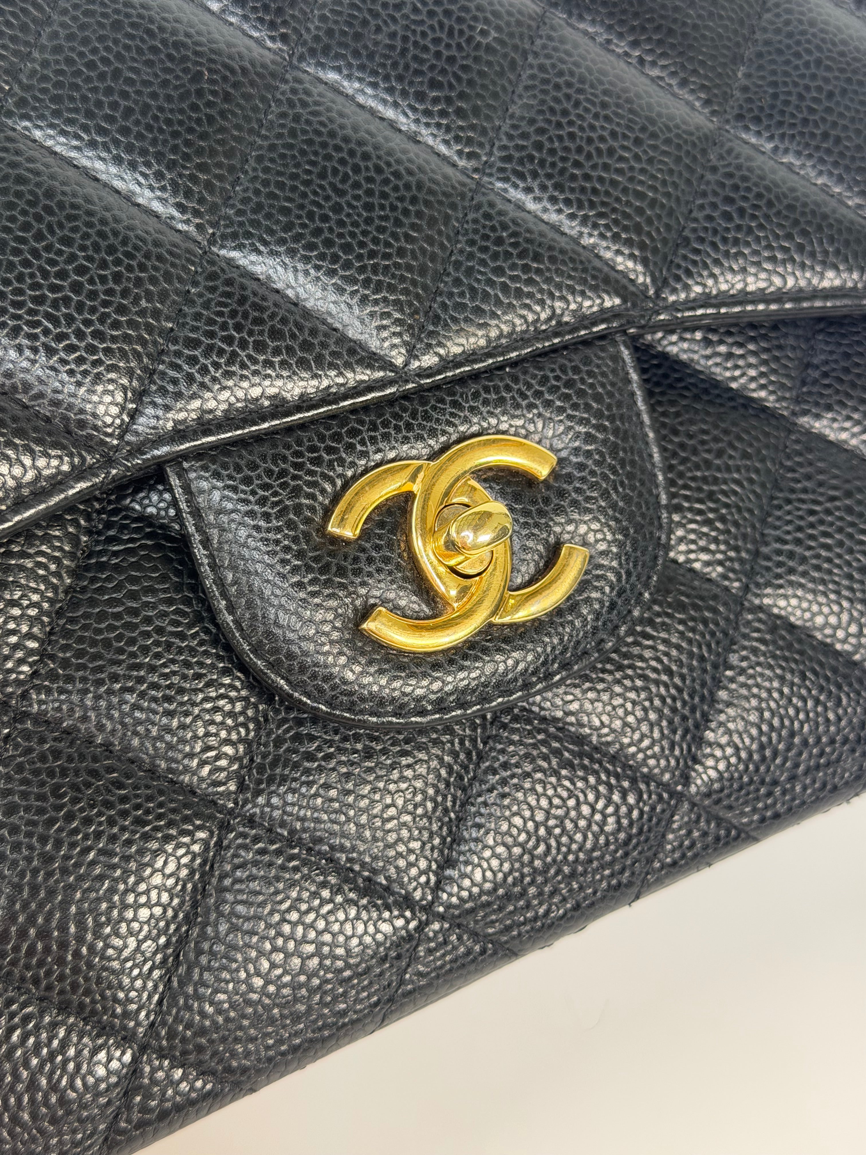 Chanel Jumbo Classic Flap Bag In Black Caviar Leather With Gold Hardware 100% authentic and preloved in excellent condition