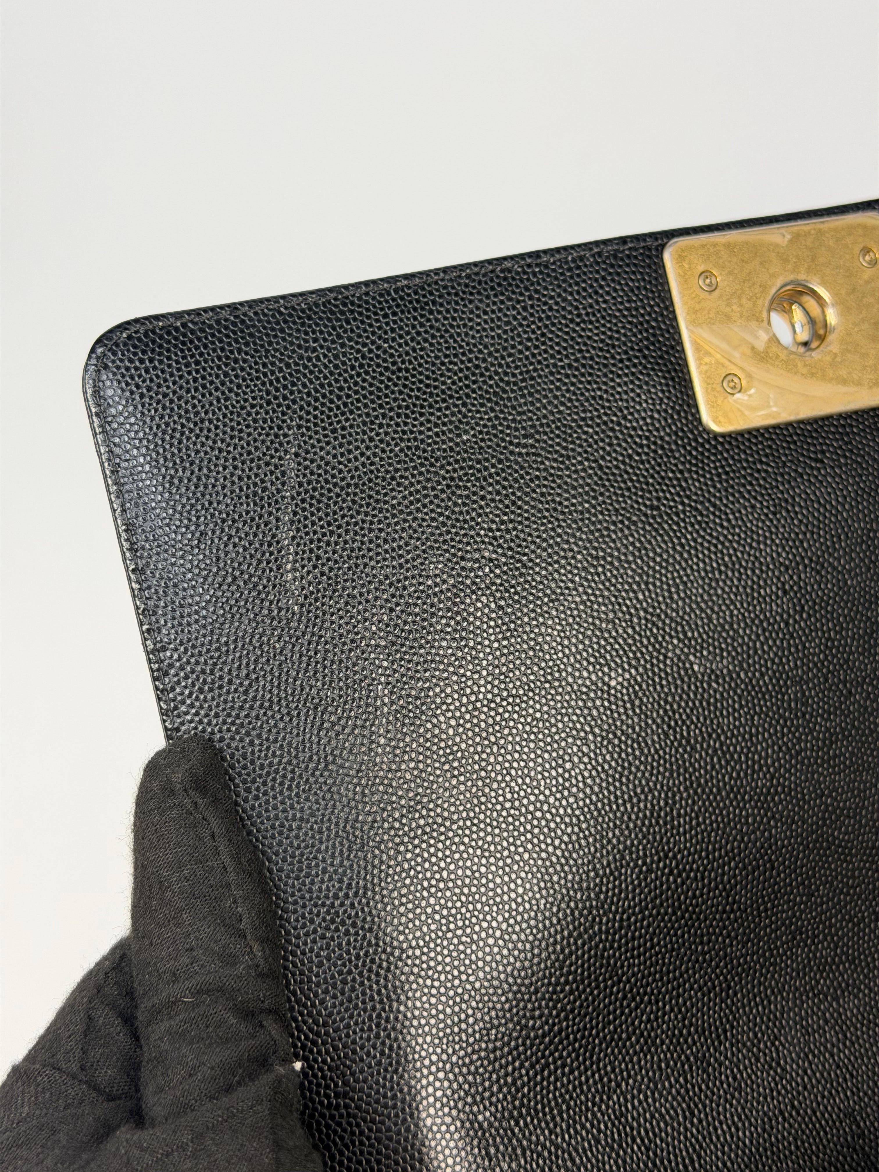 Chanel Boy Bag In Black Caviar Leather With Gold Hardware. Authentic and preloved in excellent condition. Insured next day delivery. Verified by Luxe Cheshire