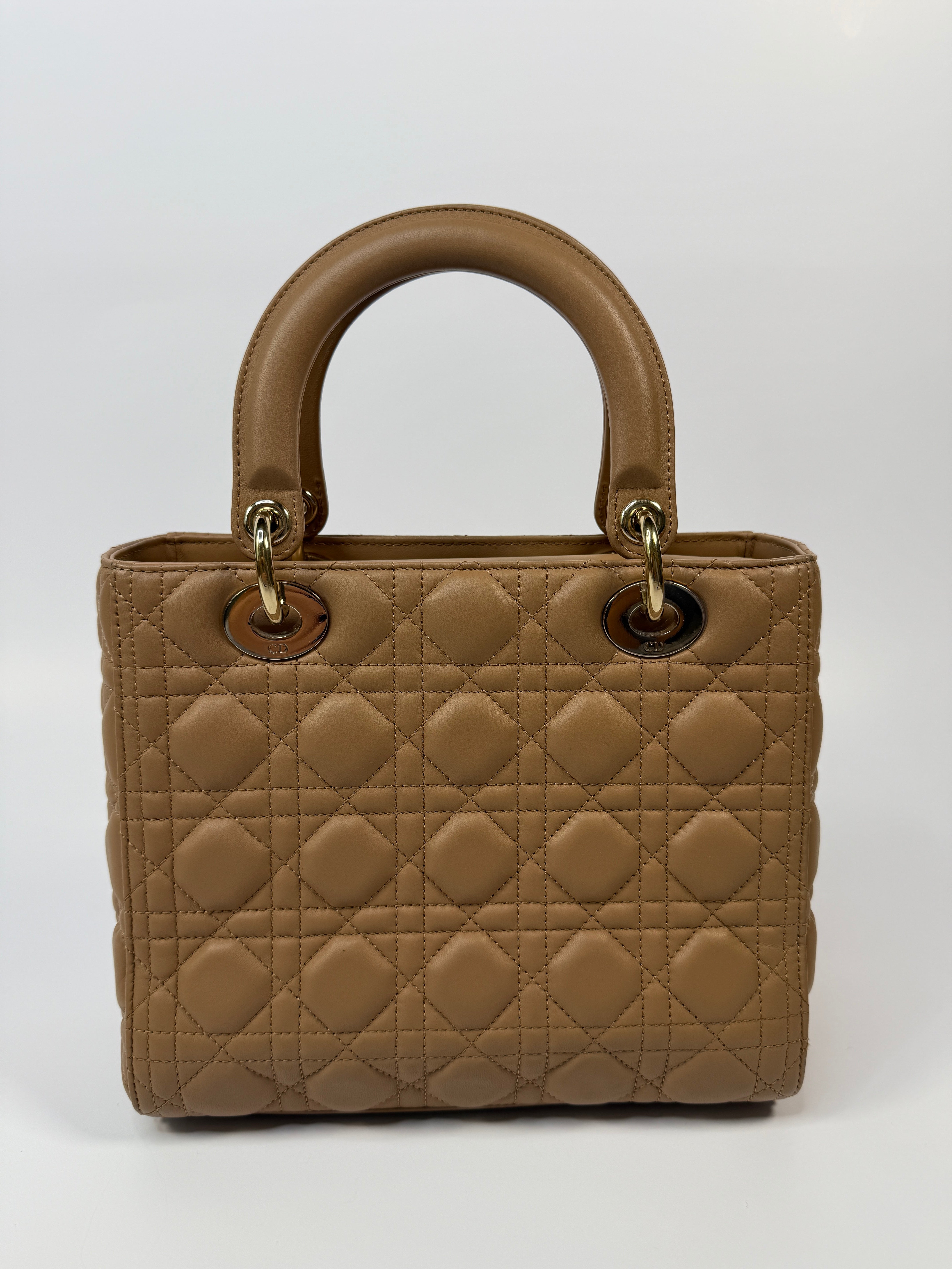 Authentic pre-loved Christian Dior Medium Lady Dior Bag in gold with gold hardware