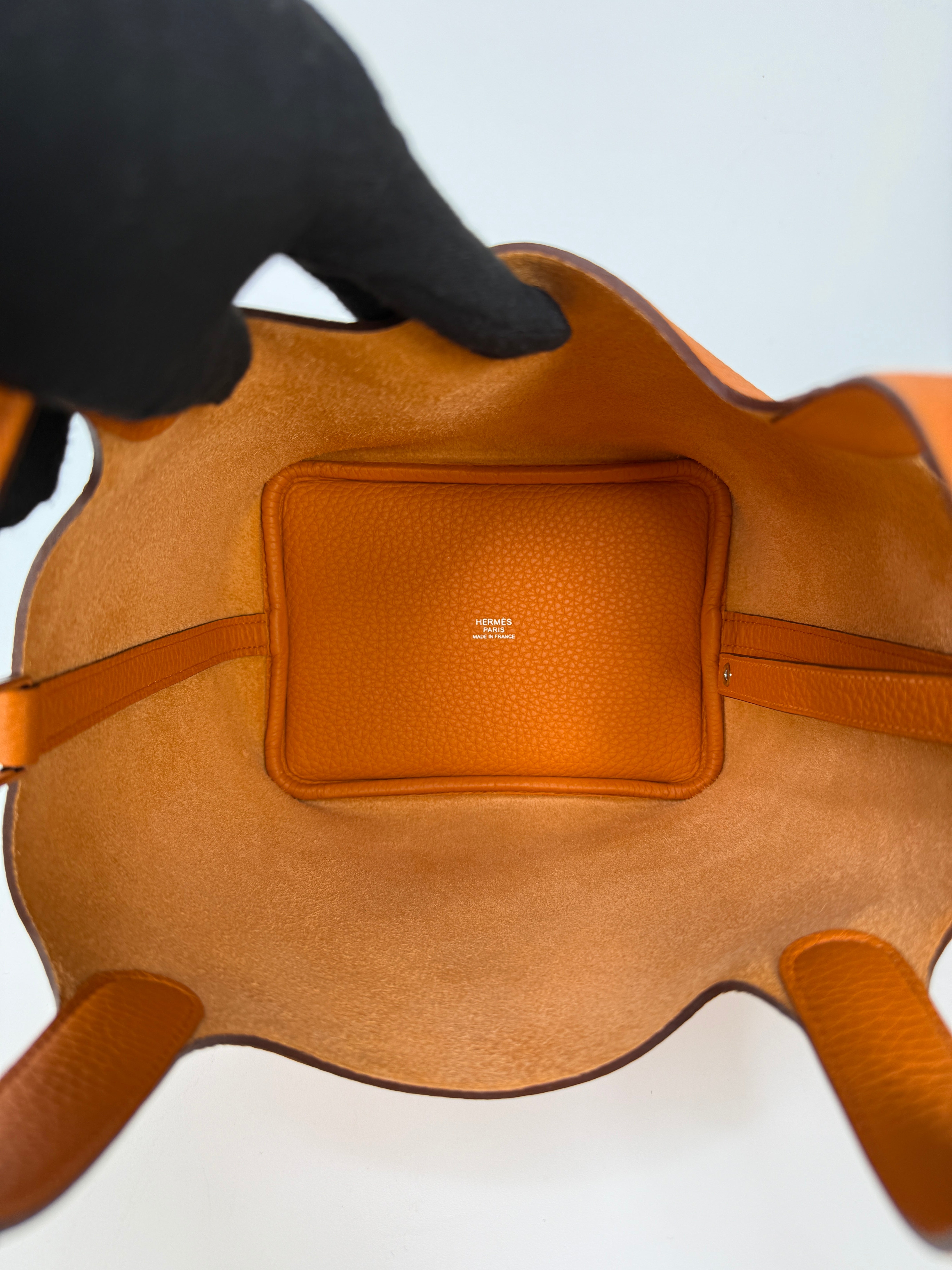 Hermès Picotin 18 In Orange Clemence Leather With Palladium Hardware
Authentic Pre Loved Verified by Luxe Cheshire Trusted Designer resale