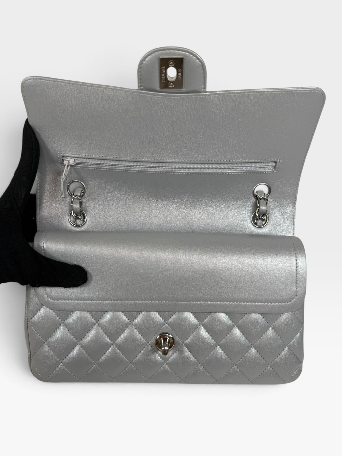 Chanel Medium Classic Double Flap In Silver Lambskin Leather Silver Hardware. 100% authentic and preloved in excellent condition