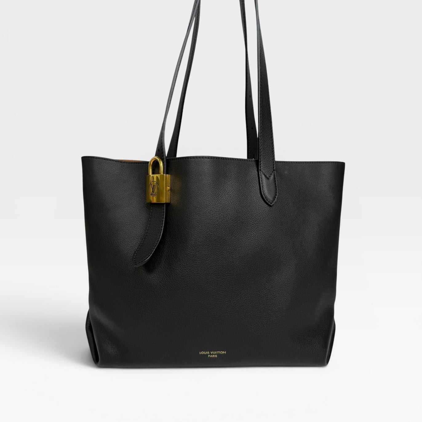 Louis Vuitton Low Key Cabas MM In Black Calfskin With Gold Hardware. Authentic and preloved in excellent condition