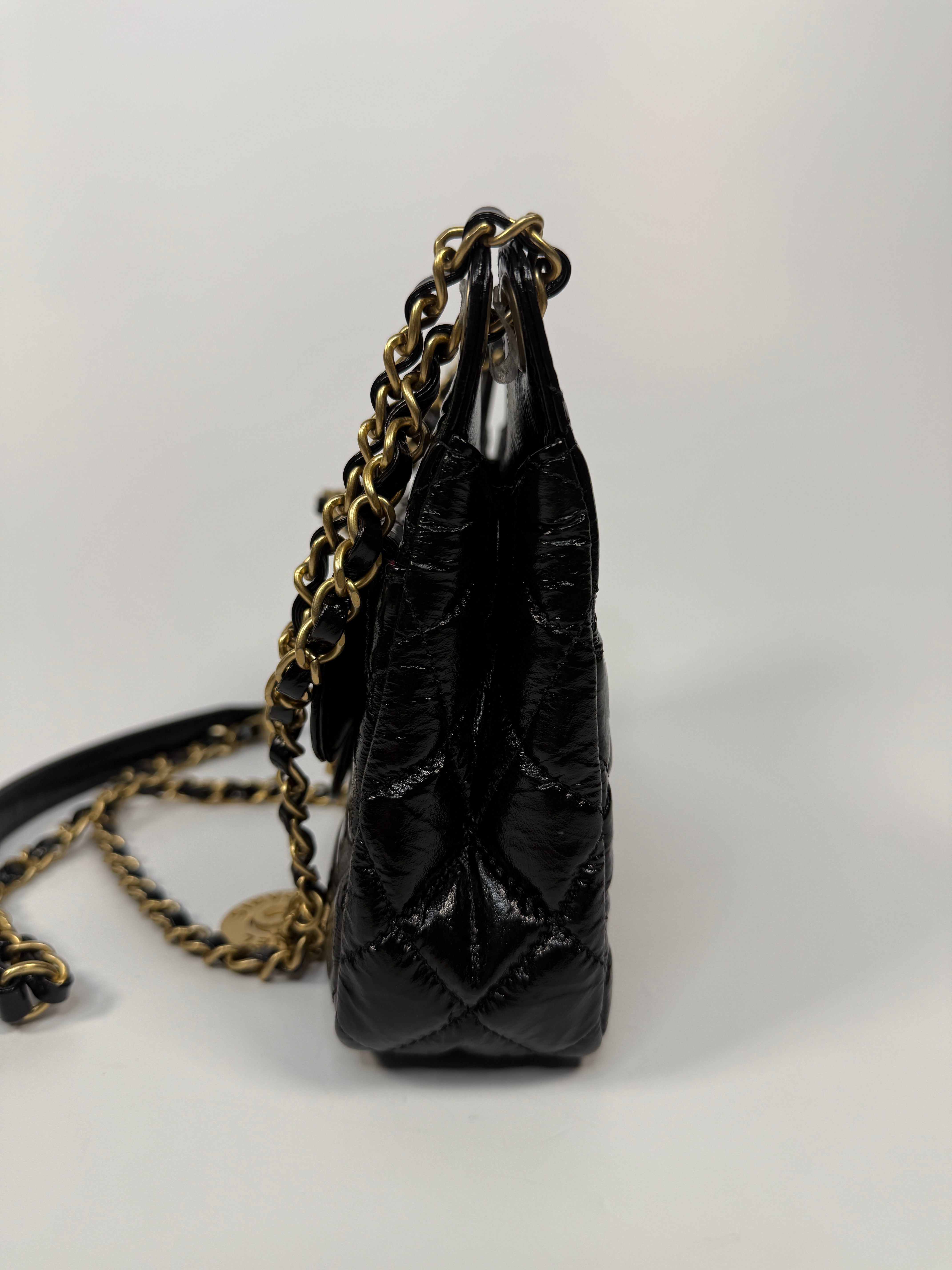 Chanel Mini Quilted Medallion Shoulder Bag In Black Calfskin With Gold Hardware. Authentic and preloved. Excellent condition.