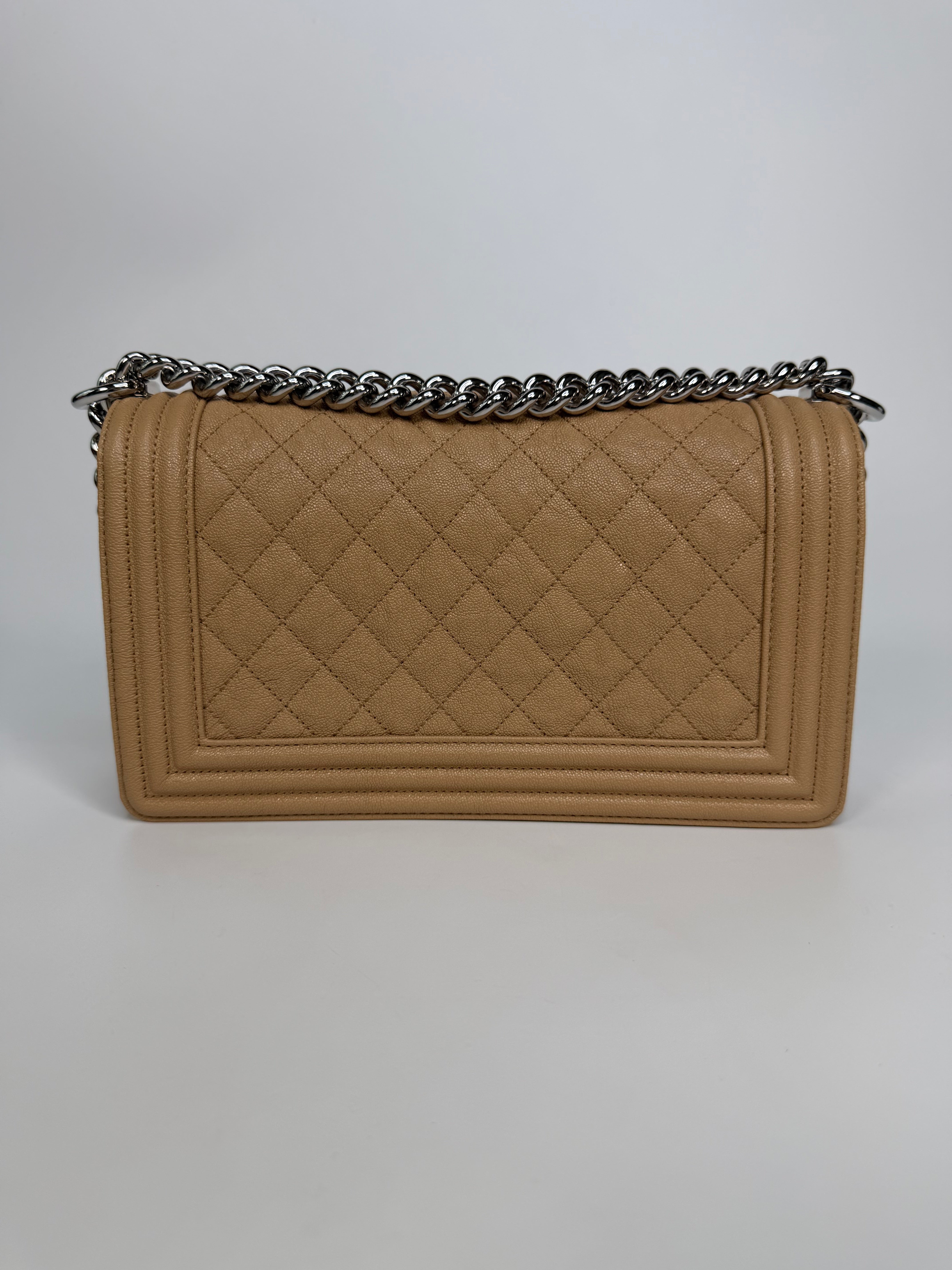 Chanel Medium Boy Bag Beige Caviar With Silver Hardware. Authentic and preloved in excellent condition