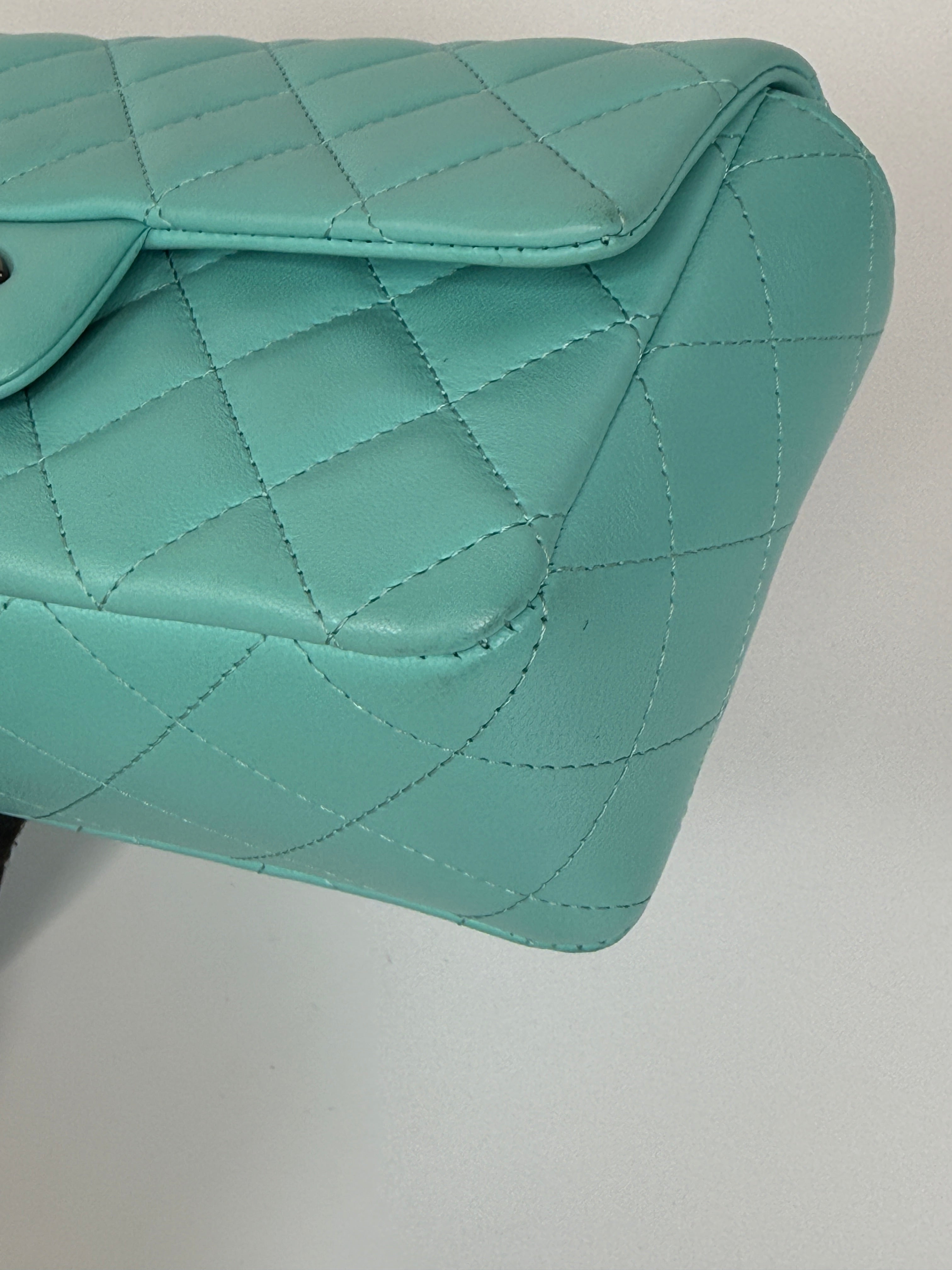 Authentic and preloved Chanel Mini Rectangle Flap Bag In Turquoise Lambskin Leather With Gunmetal Hardware In Excellent condition. Verified by Luxe Cheshire. 100% Authenticity Guarantee.