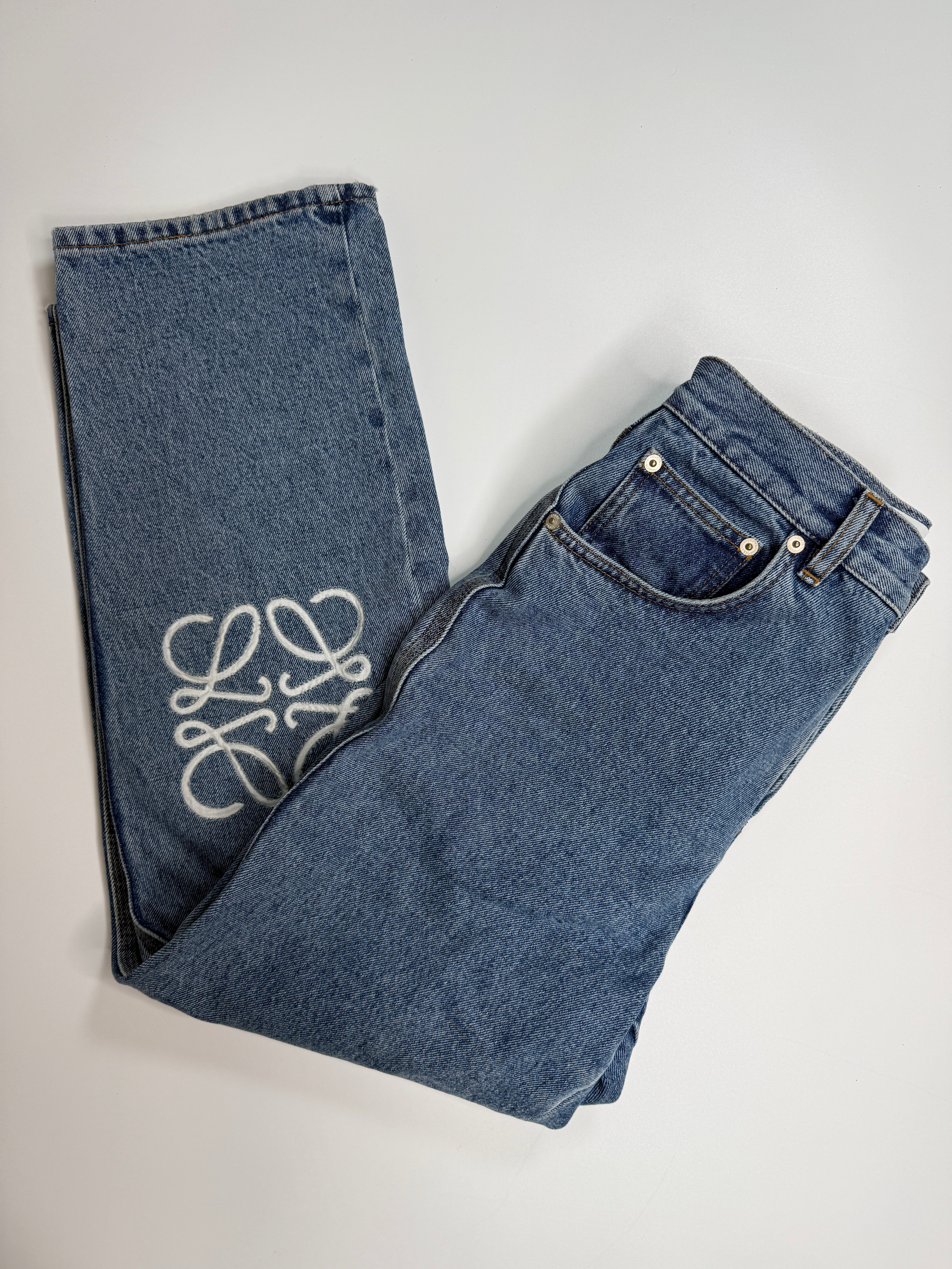 Authentic and preloved Loewe Anagram Denim Jeans (Size 36/UK8) In Blue Denim. Excellent Condition. Fully Insured next day delivery. Verified by Luxe Cheshire.