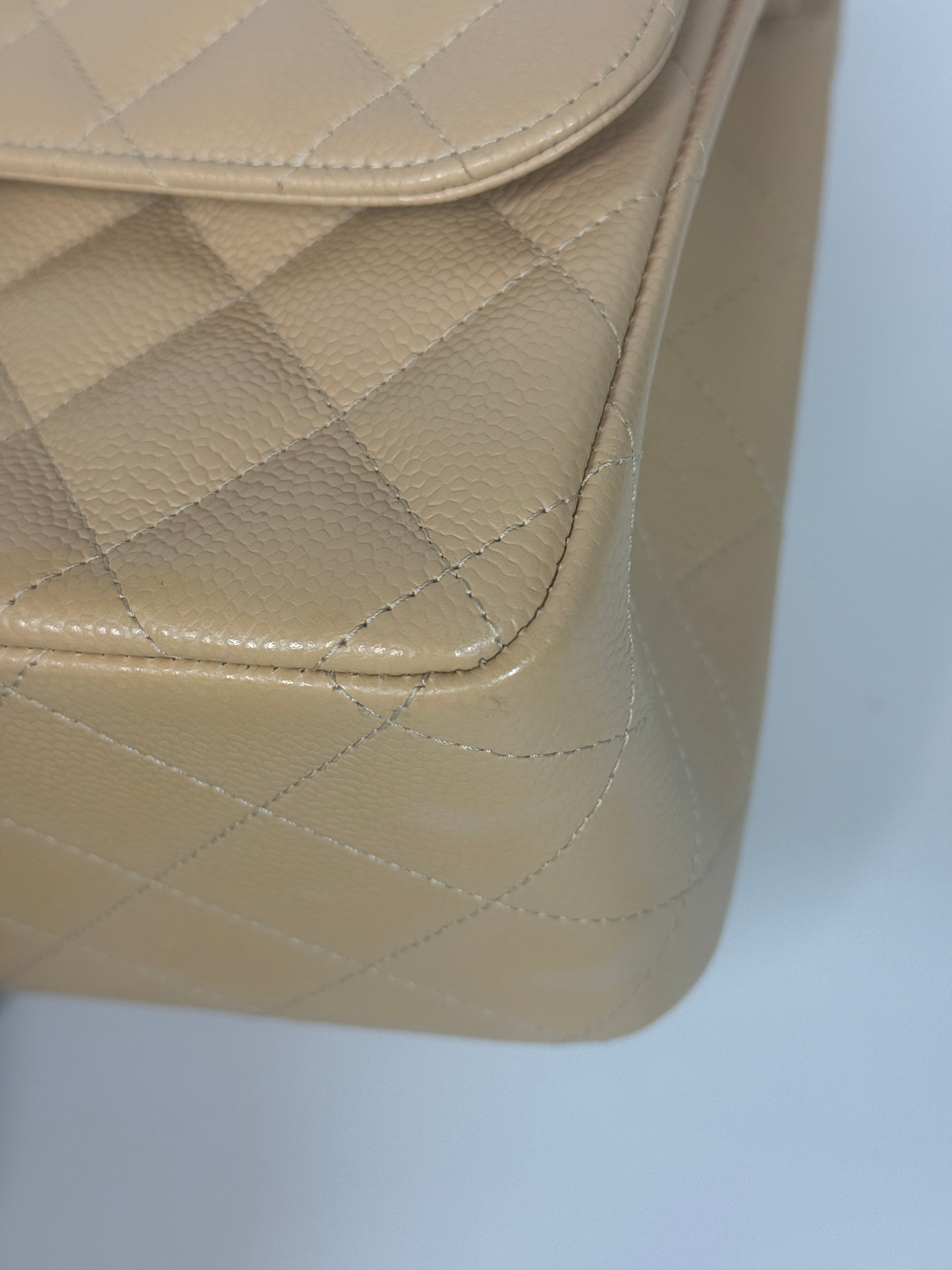 Authentic and preloved Chanel Jumbo Classic Flap Bag In Beige Caviar Leather With Silver Hardware. 100% Authenticity guarantee. Verified by Luxe Cheshire. Fully Insured next day delivery
