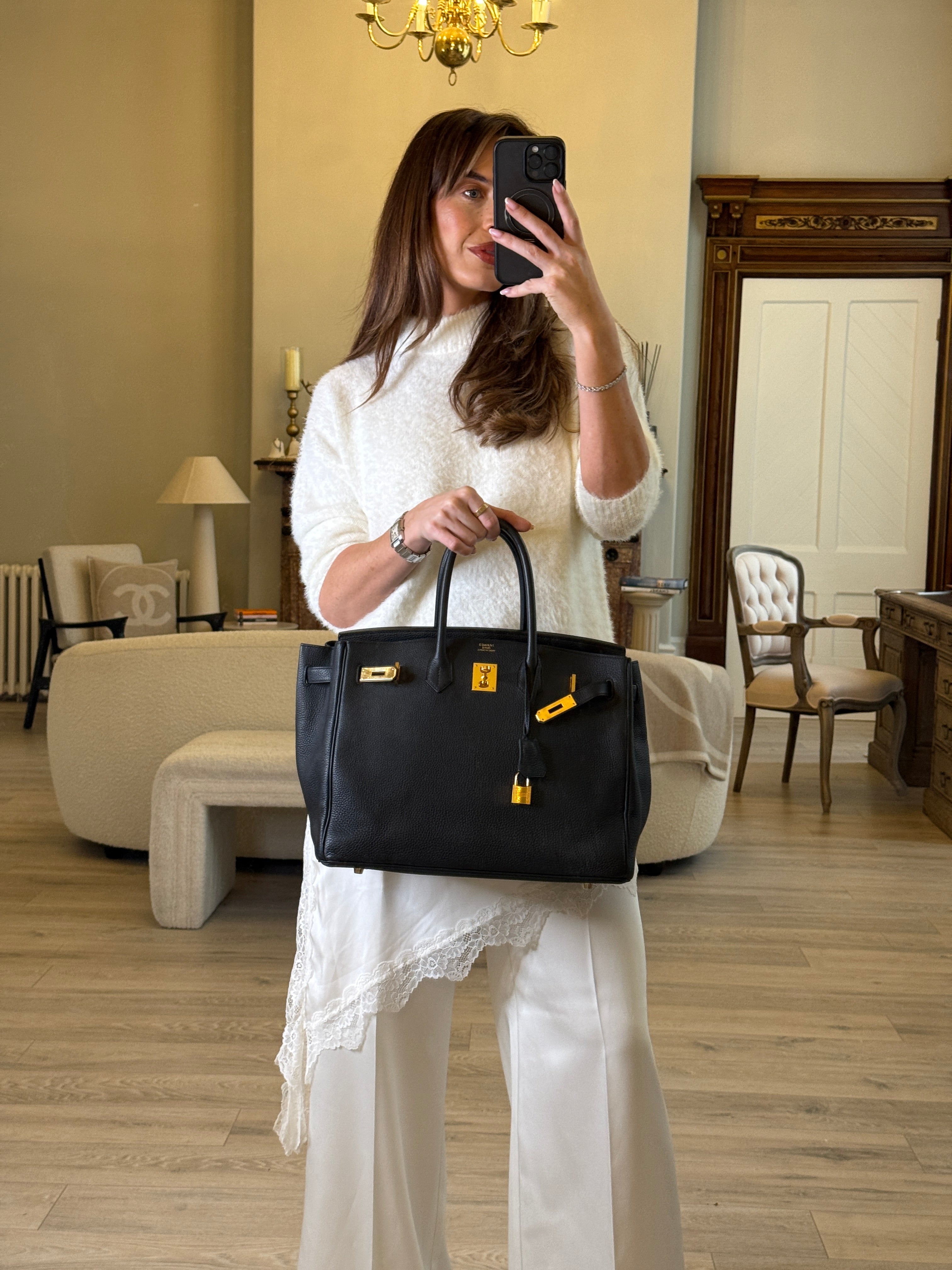Hermès Birkin 35 Black Togo Leather With Gold Hardware. Excellent condition. Authentic and preloved.