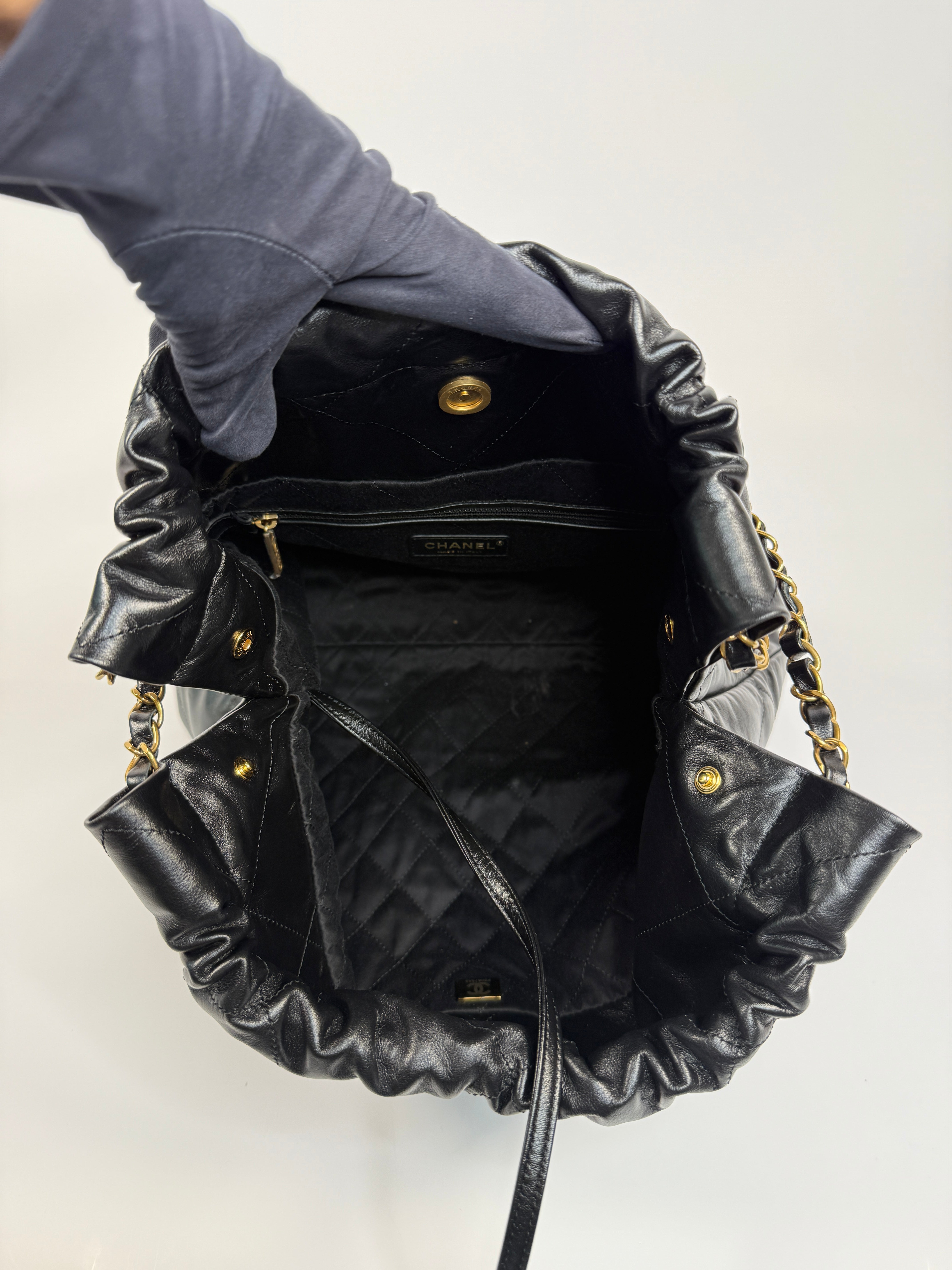 Chanel 22 Handbag In Black Calfskin Leather With Gold Hardware. Excellent Condition. Authentic and Preloved