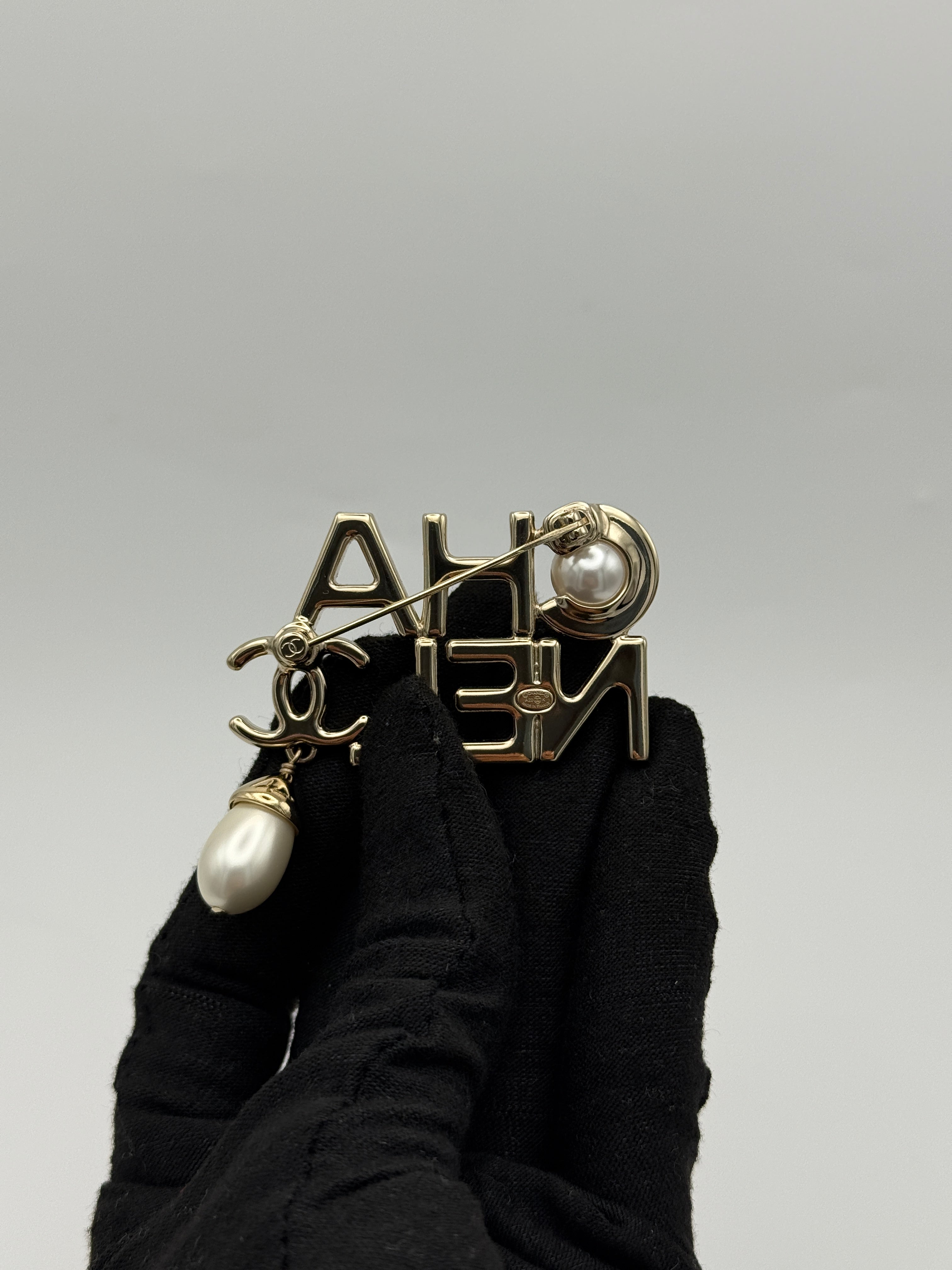 Chanel CC Pearl Drop Logo Brooch, authentic and preloved in excellent condition