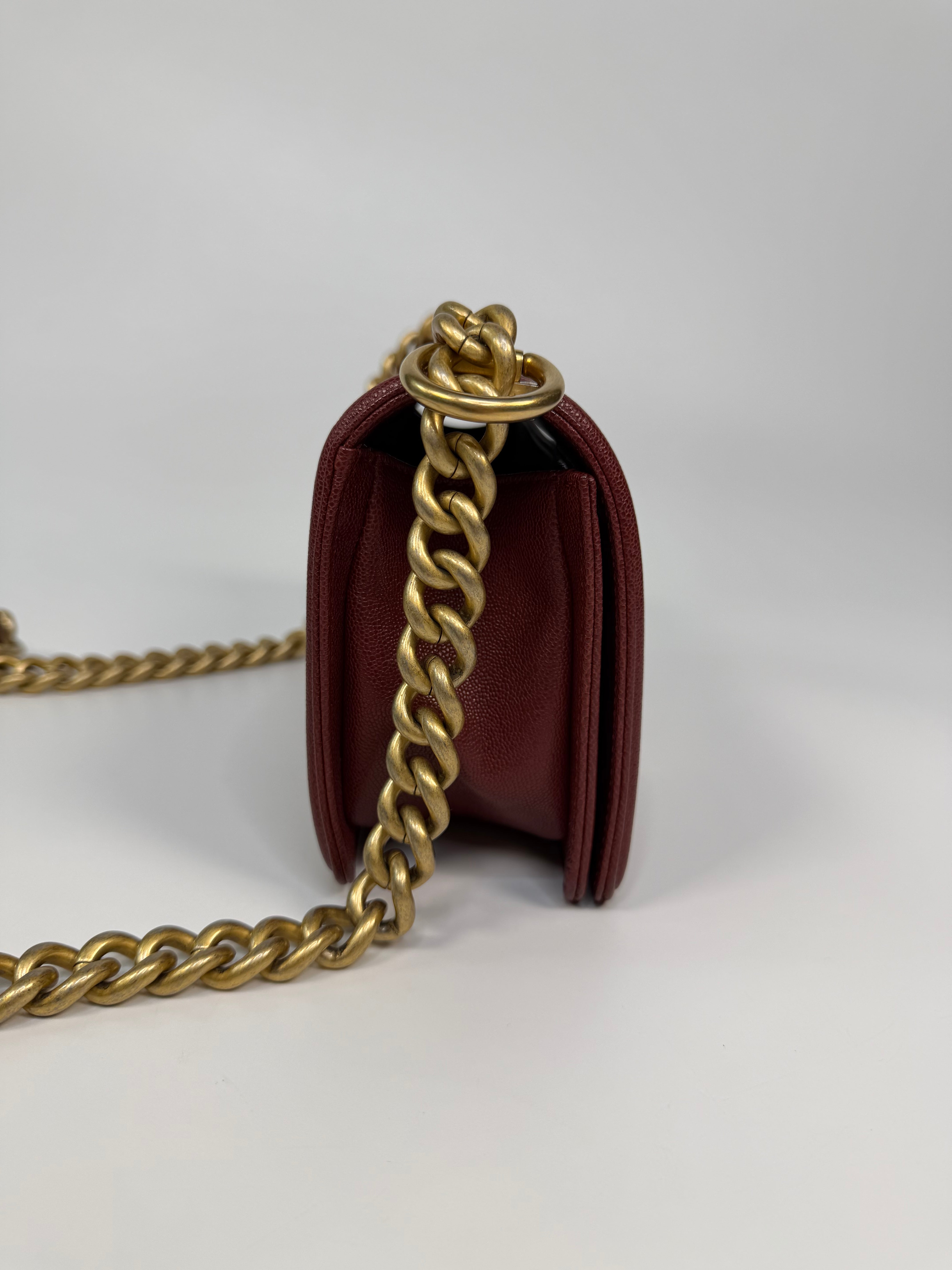 Chanel Le Boy Bag In Burgundy Caviar Leather Gold Hardware. Authentic and preloved in excellent condition.