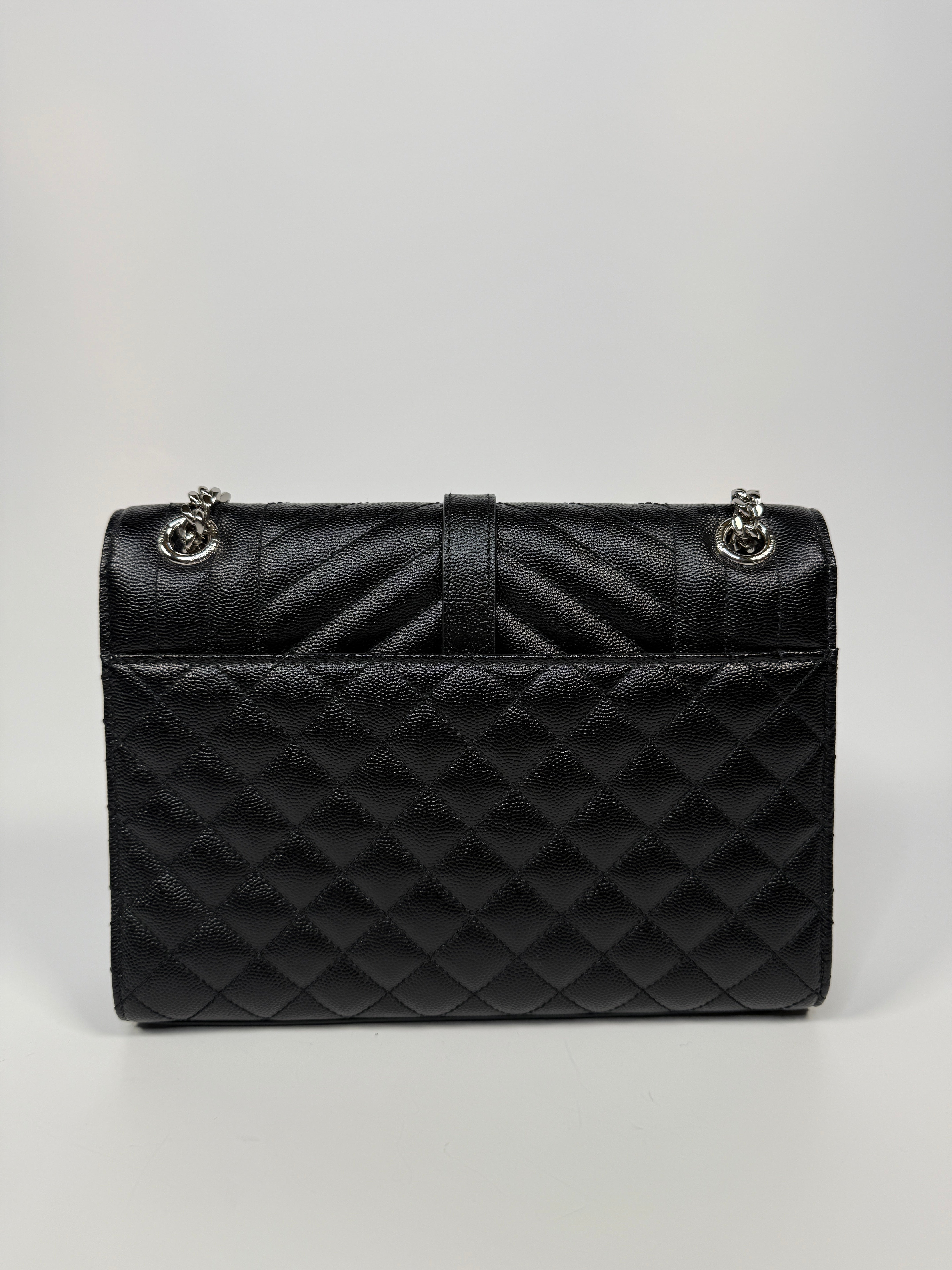 Saint Laurent Medium Envelope Bag In Blacked Grained Leather With Silver Hardware. Authentic and preloved. Excellent Condition