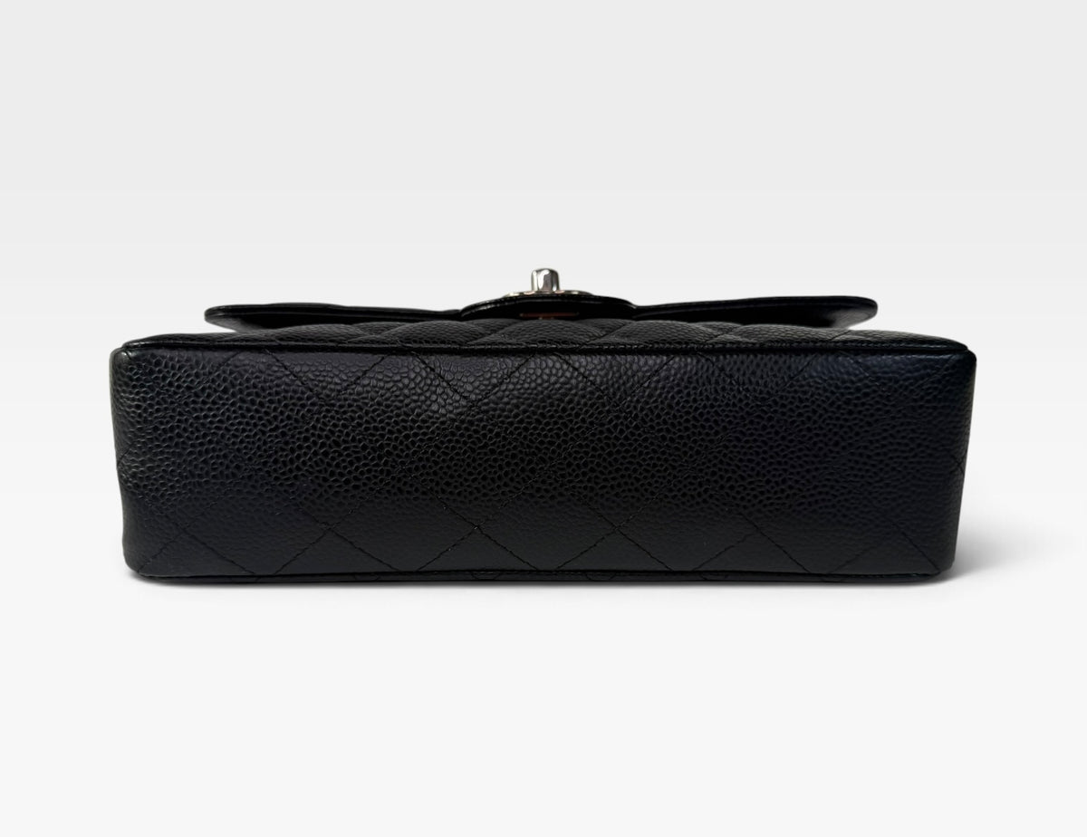 Chanel Vintage Small Classic Double Flap In Black Caviar Leather With Silver Hardware. 100% authentic and preloved in excellent condition