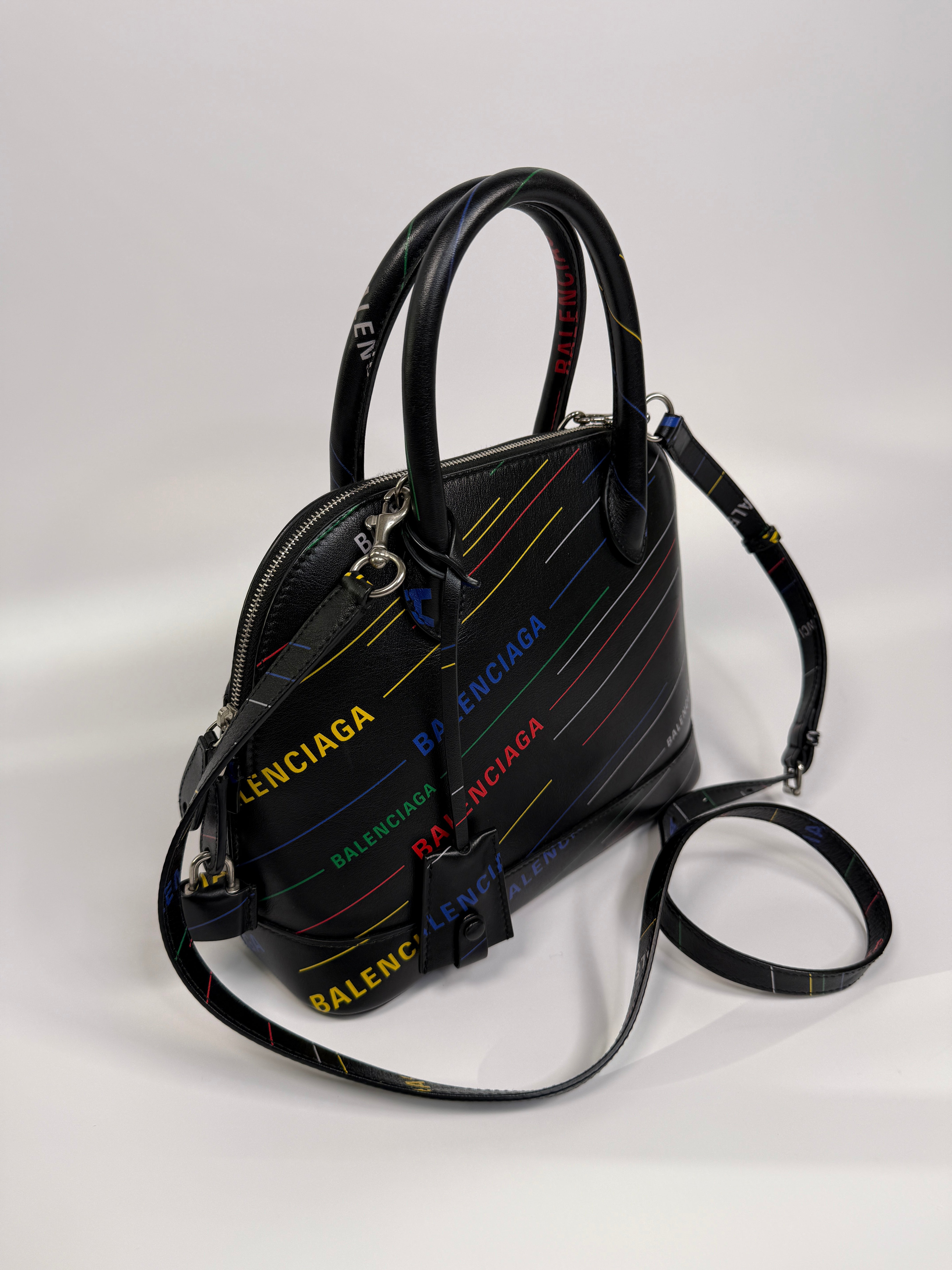 Balenciaga Ville Top Handle Bag In Black with Coloured Logo Writing. Authentic and preloved in excellent condition