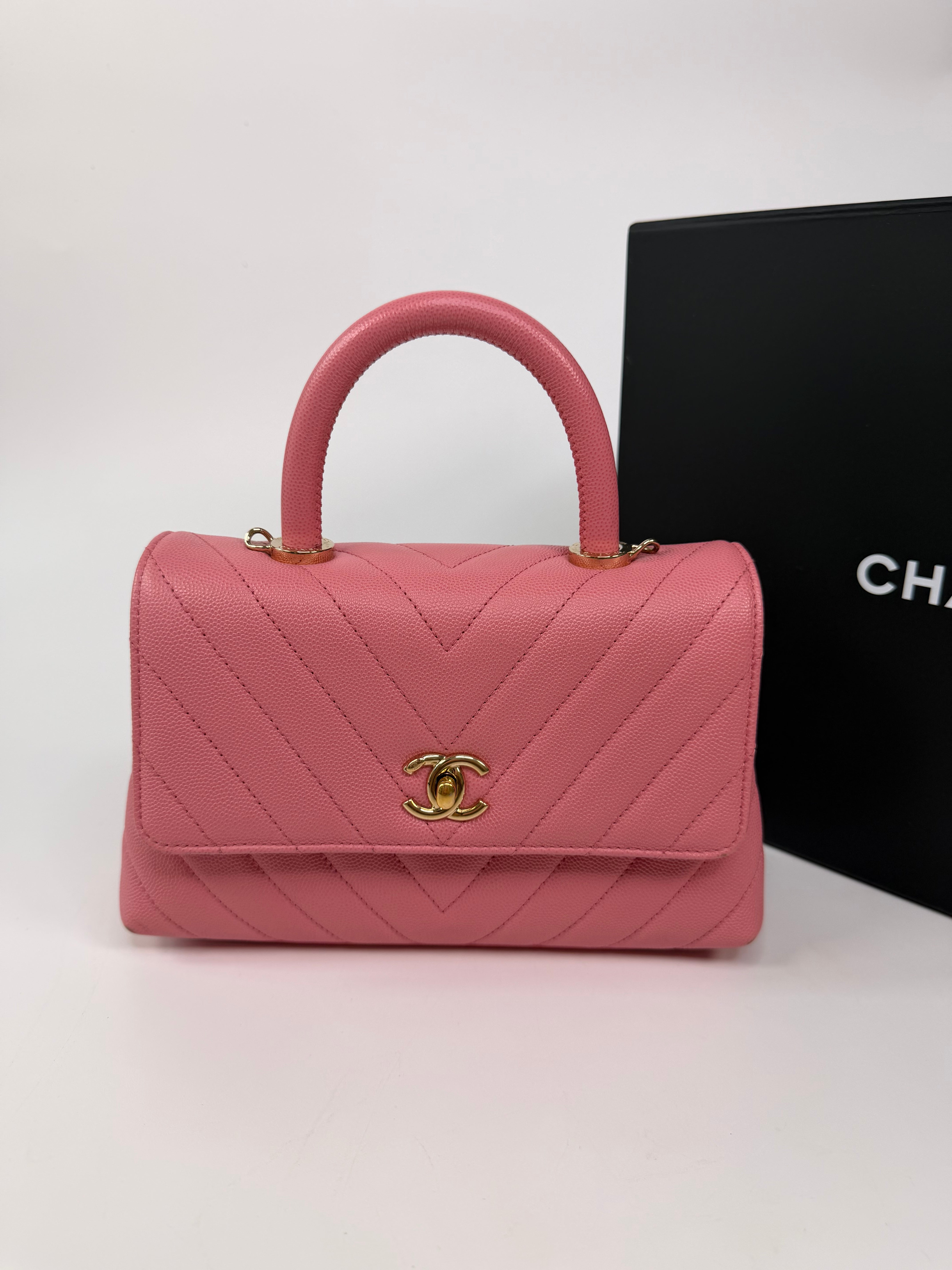 Chanel Small Chevron Coco Top Handle In Pink Caviar With Gold Hardware. 100% authentic and preloved in very good condition.