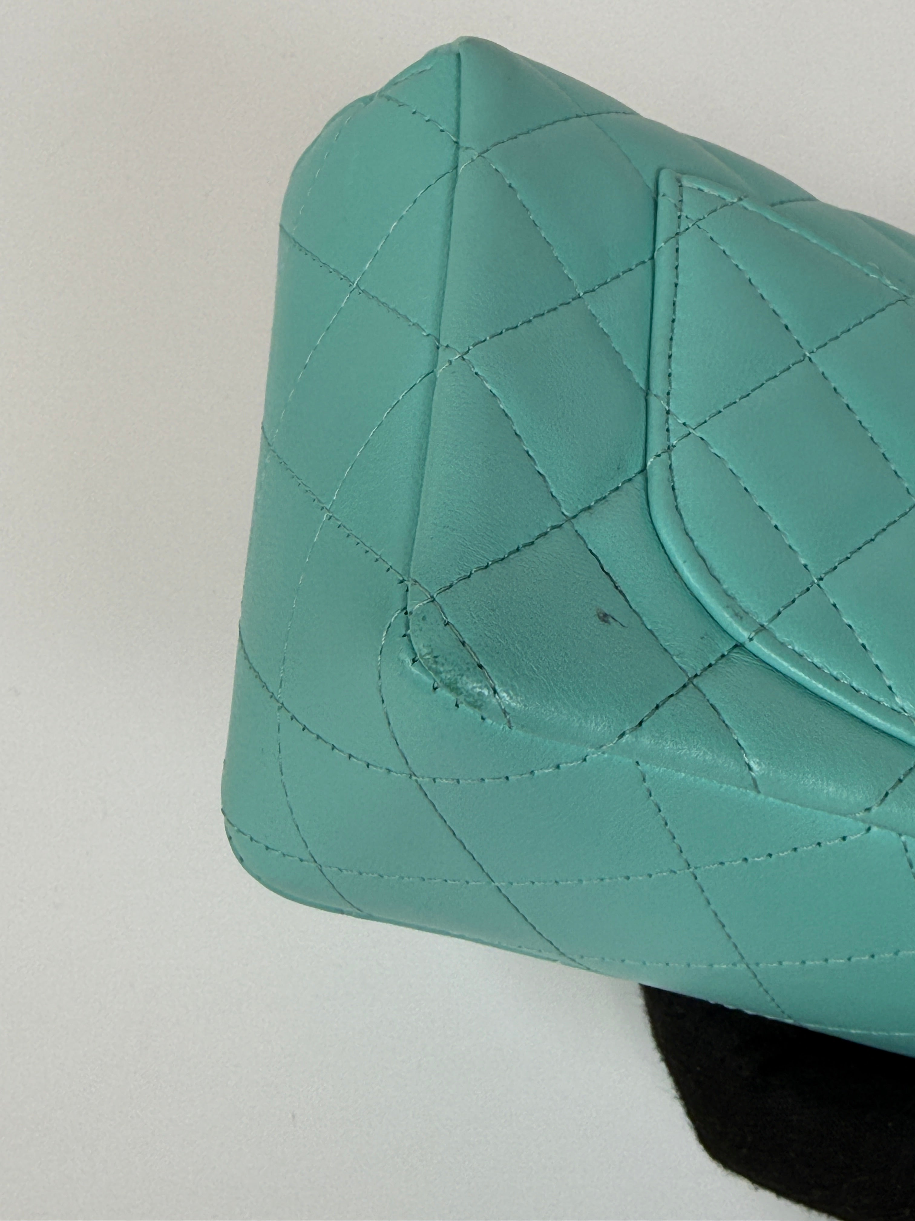 Authentic and preloved Chanel Mini Rectangle Flap Bag In Turquoise Lambskin Leather With Gunmetal Hardware In Excellent condition. Verified by Luxe Cheshire. 100% Authenticity Guarantee.