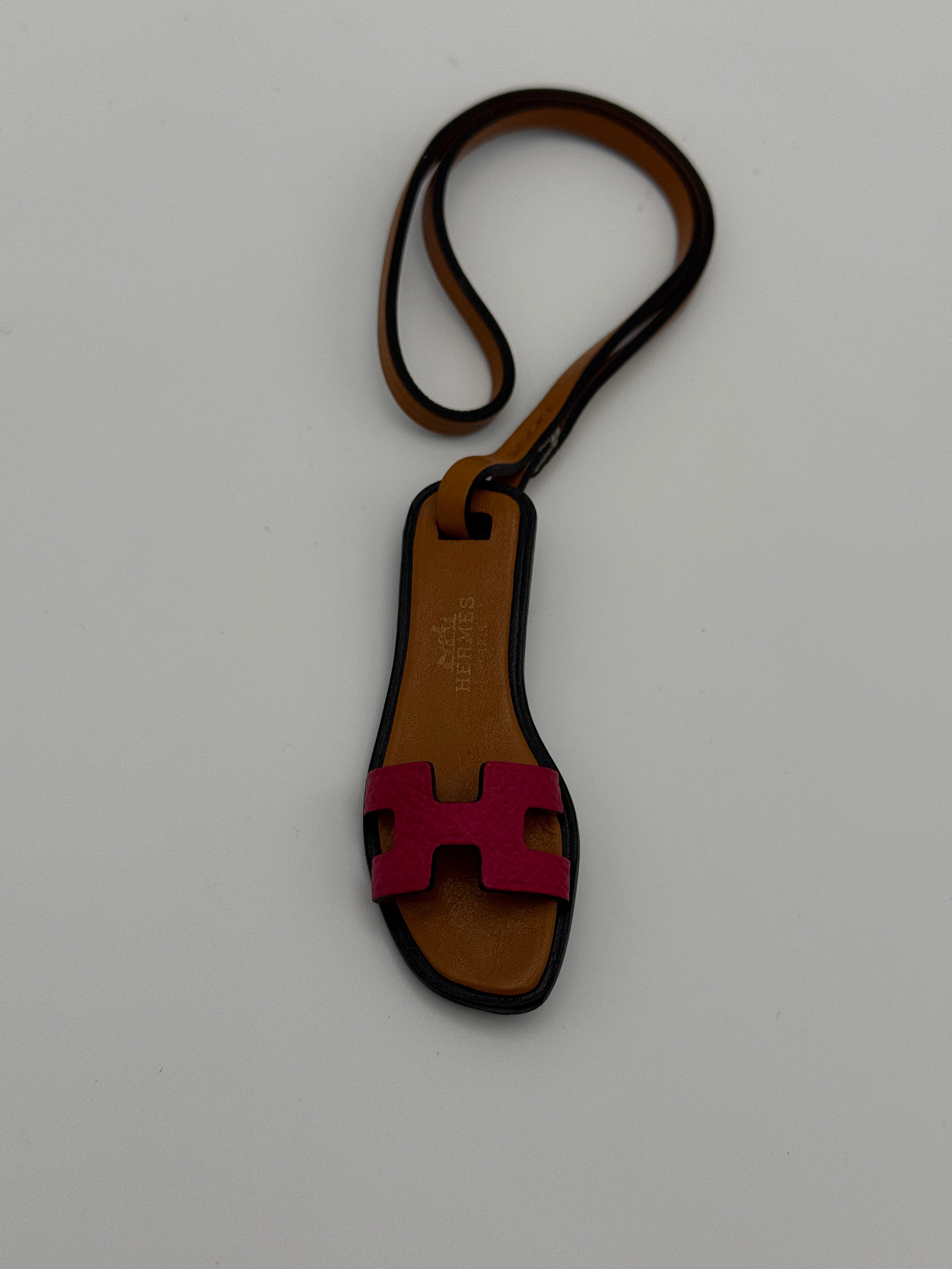 Hermes Oran Nano Bag Charm in Framboise/Natural Sable. Very Good Condition. Authentic and preloved