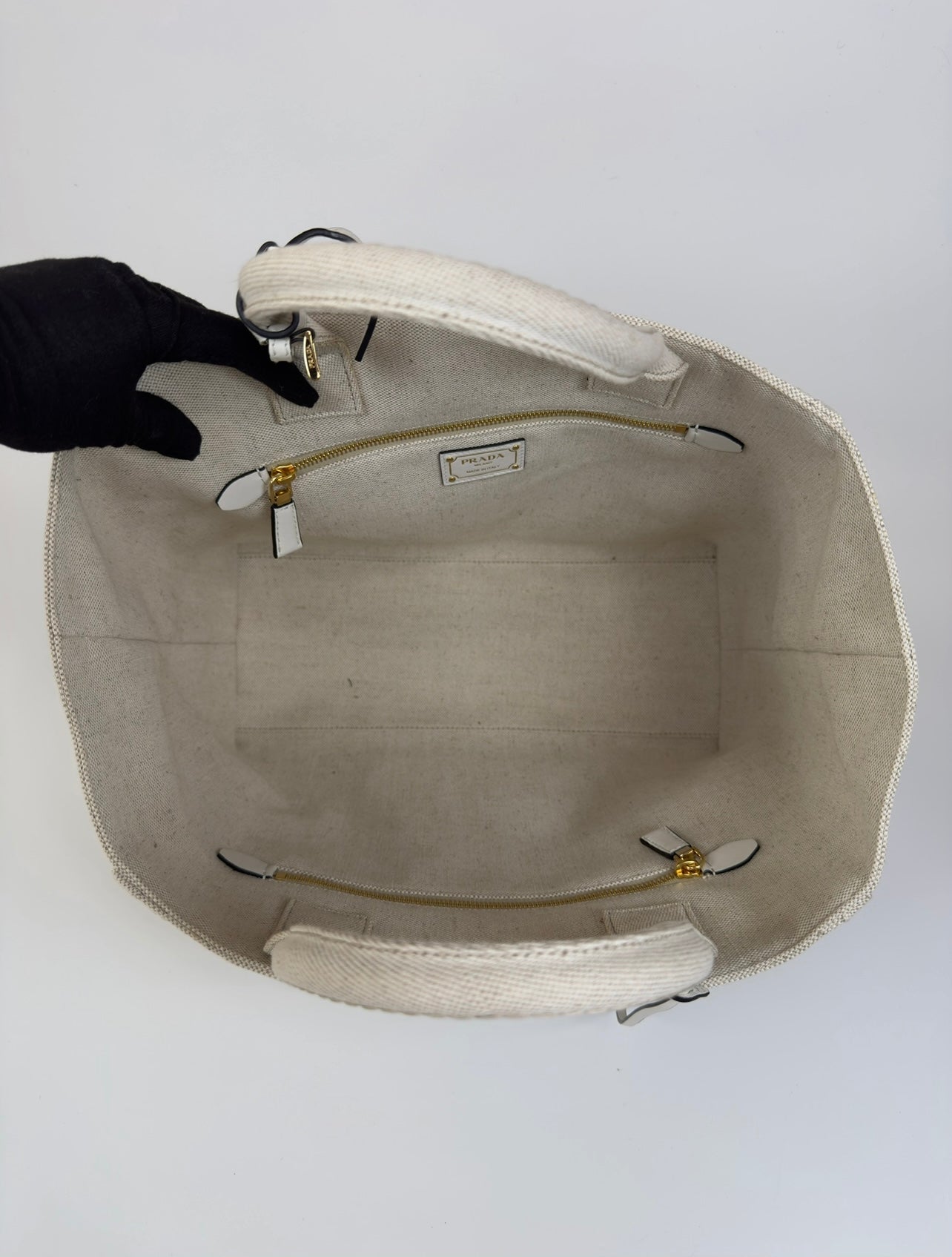 Authentic and preloved Prada Large Appliqué Cotton Tote In Sand Beige Canvas. Excellent Condition. 100% Authenticity guarantee.