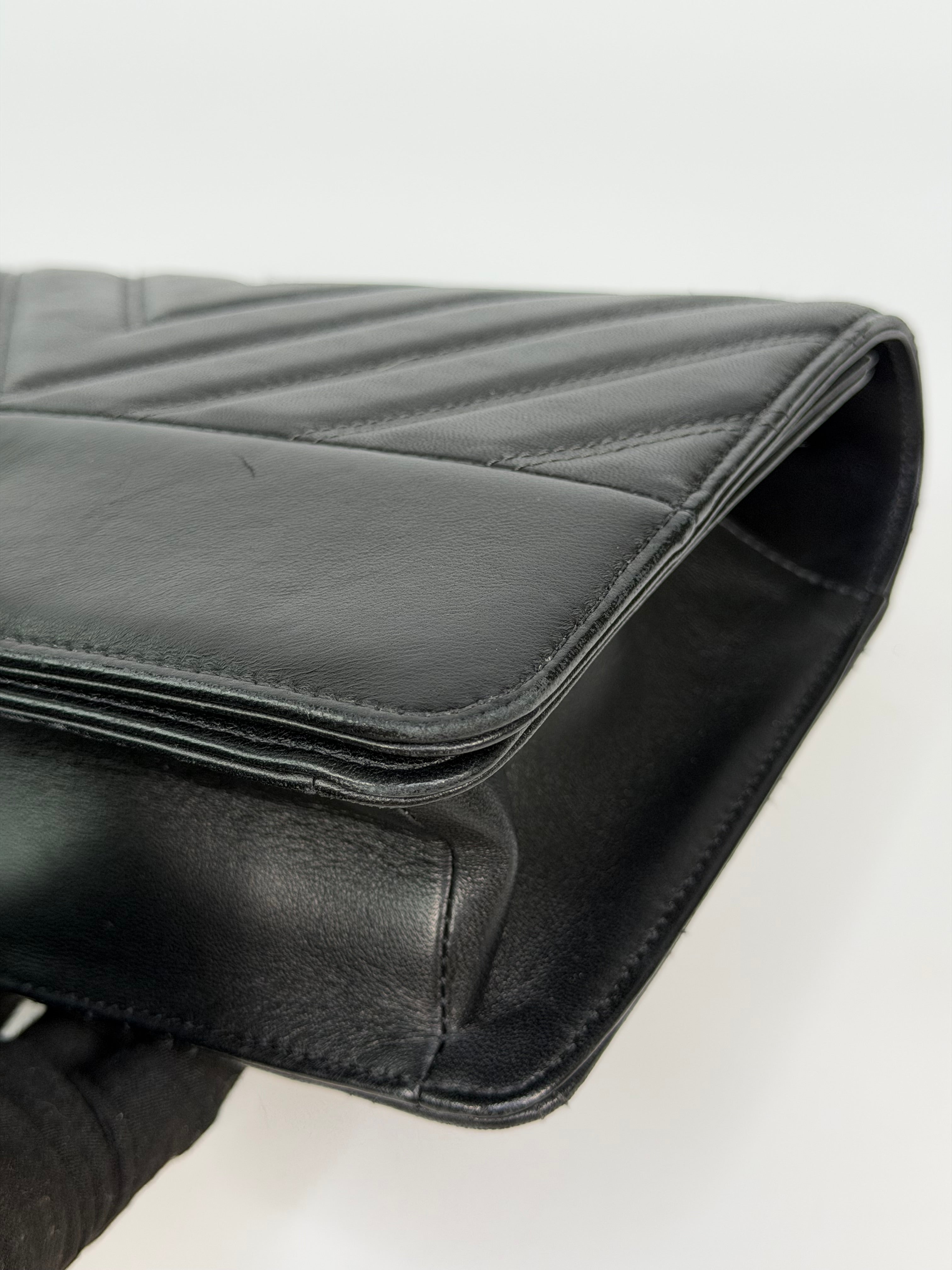Chanel Chevron Flap In Black Lambskin Leather With Gold Hardware. Authentic and preloved in excellent condition. 100% guarantee