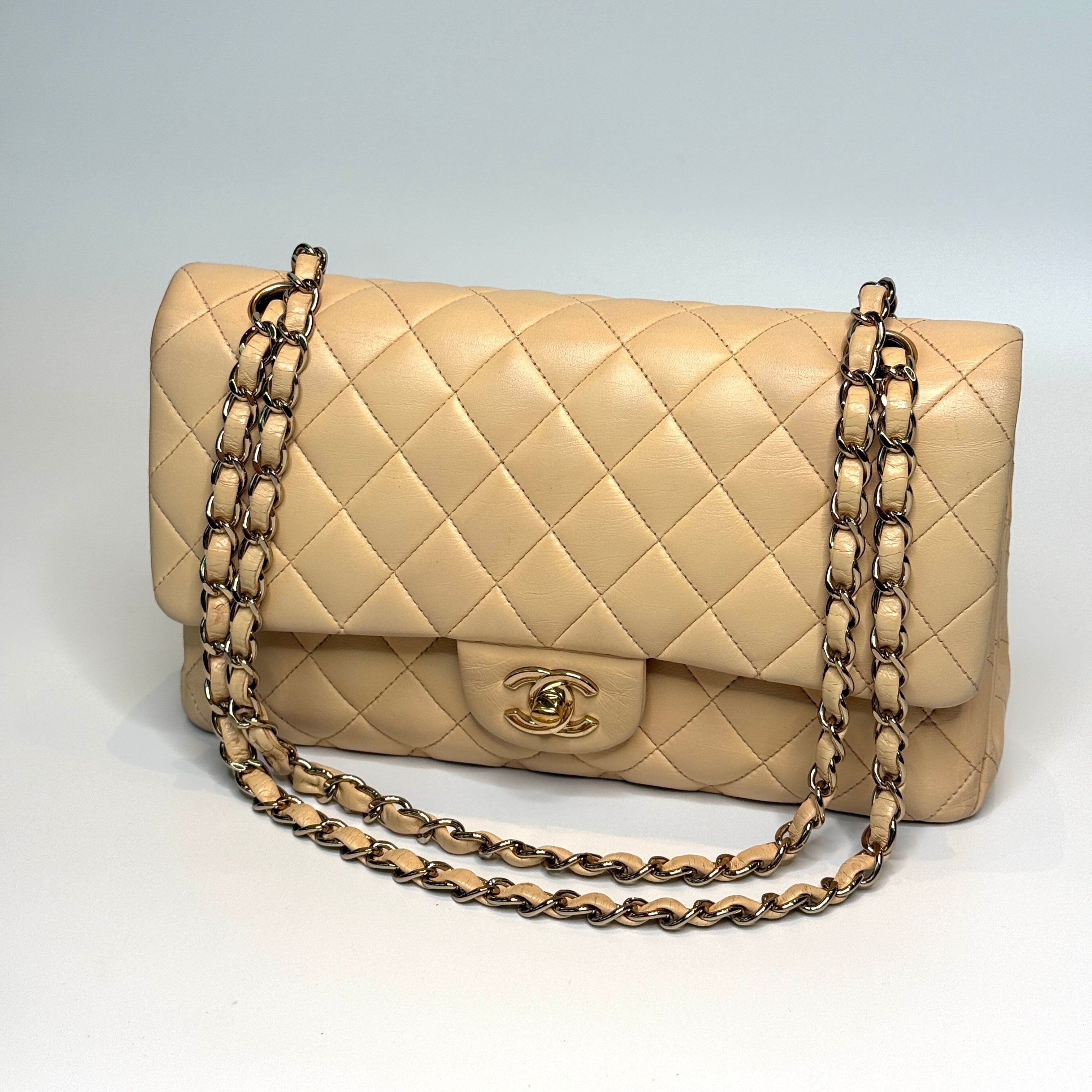 Chanel Medium Classic Double Flap Beige Lambskin Leather With Gold Hardware
Pre Loved & Authentic