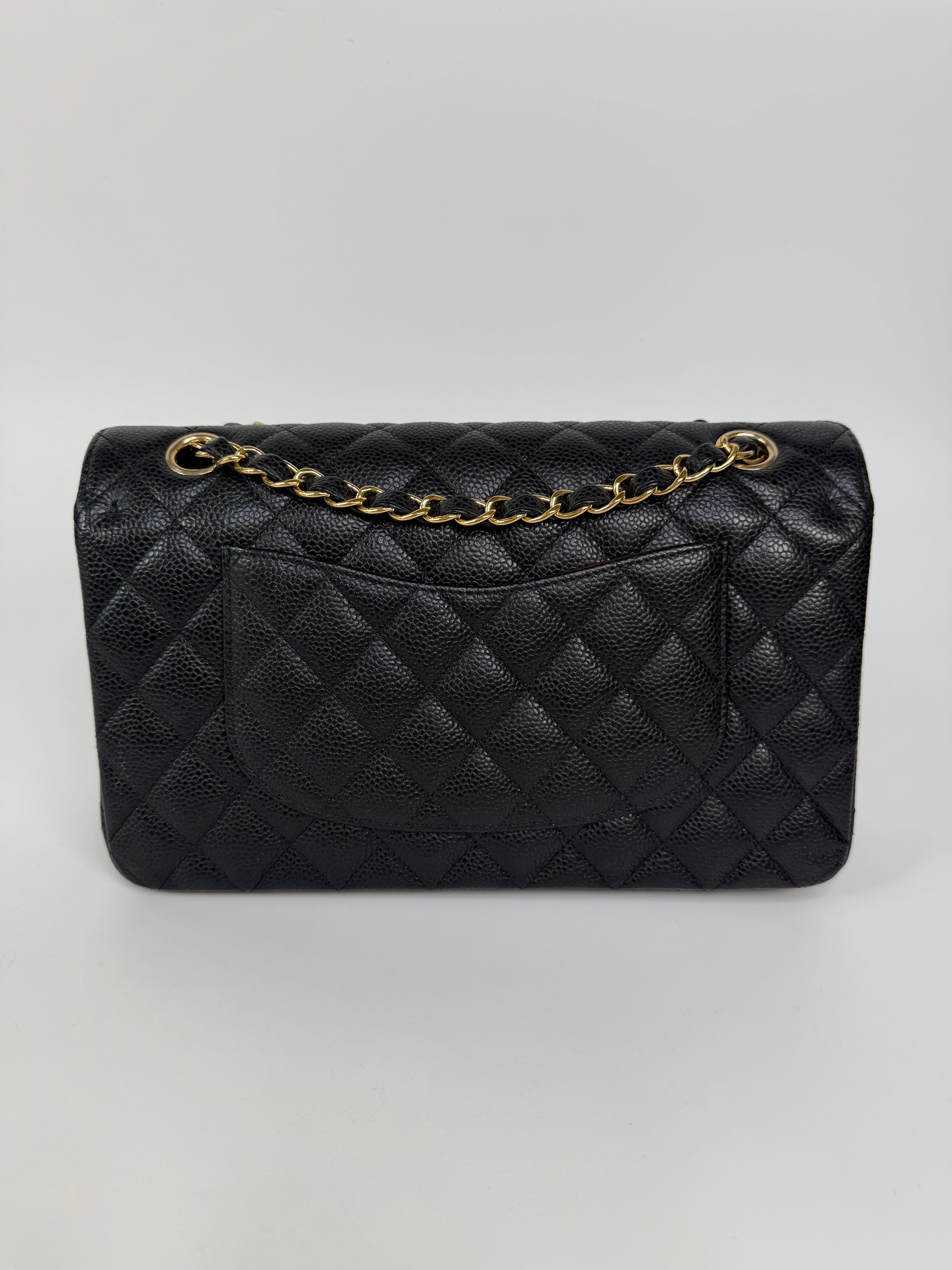Chanel Medium Classic Double Flap Black Caviar Gold Hardware. Authentic and preloved in excellent condition. 100% guarantee