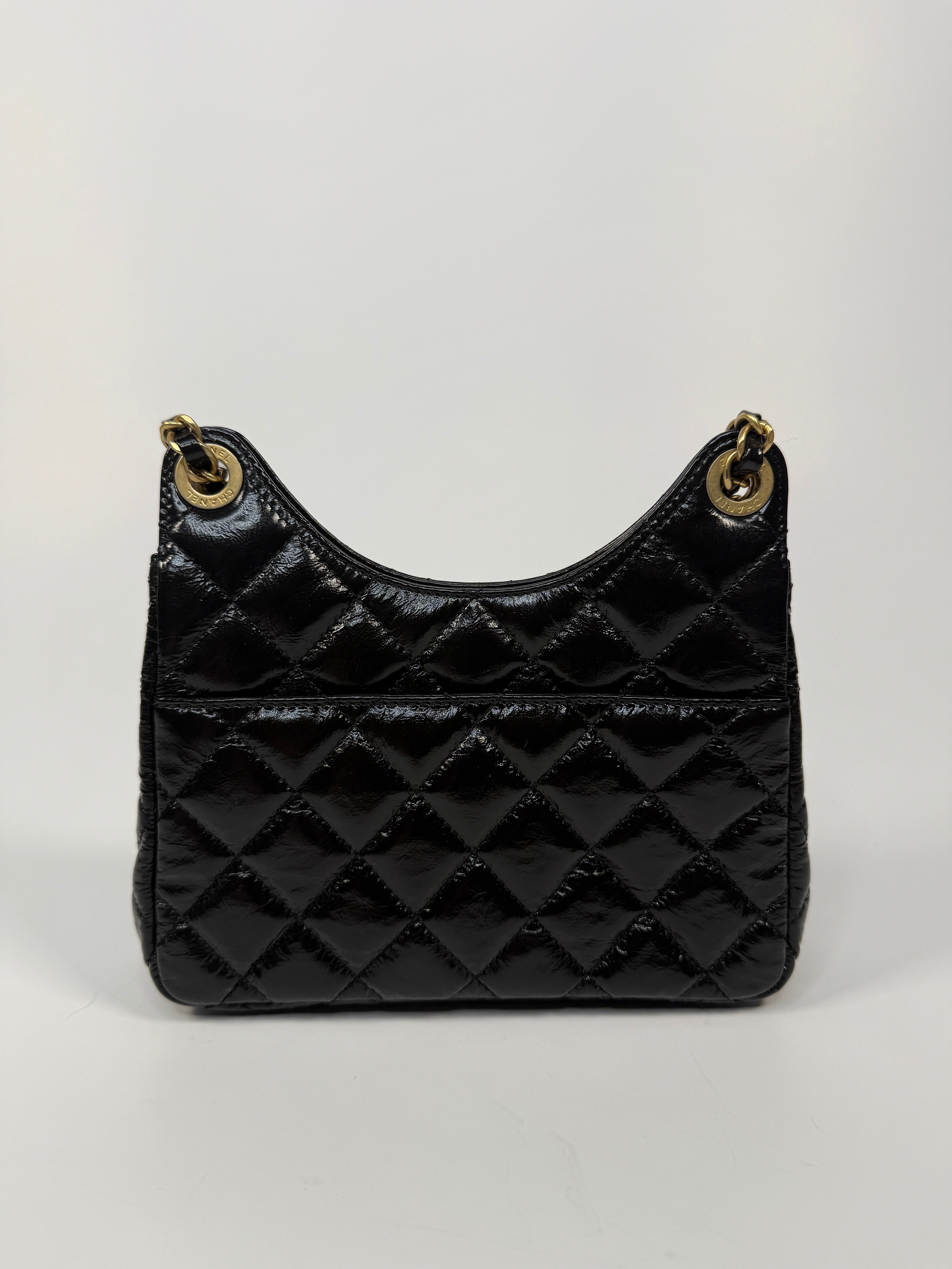 Chanel Mini Quilted Medallion Shoulder Bag In Black Calfskin With Gold Hardware. Authentic and preloved. Excellent condition.