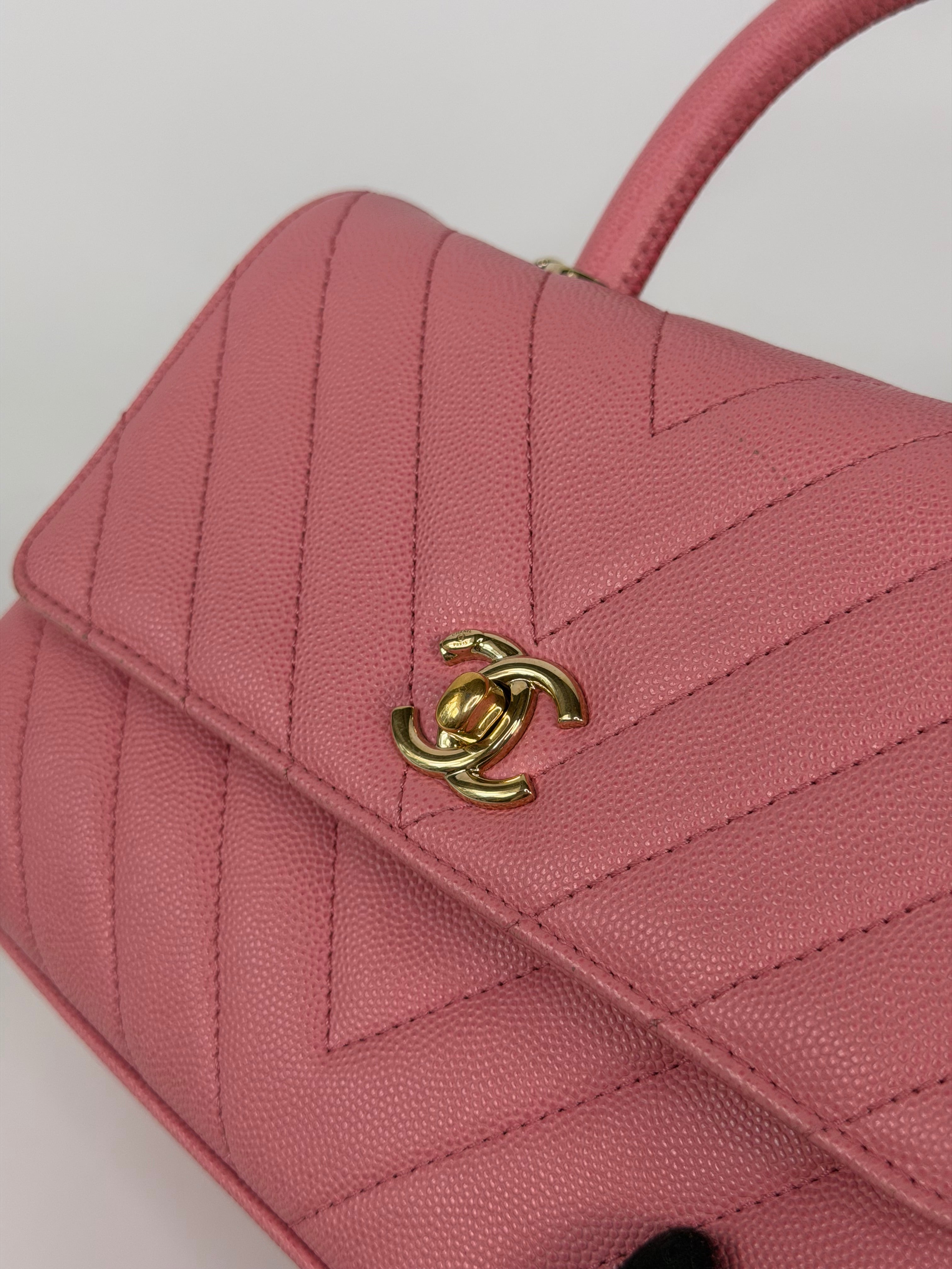 Chanel Small Chevron Coco Top Handle In Pink Caviar With Gold Hardware. 100% authentic and preloved in very good condition.