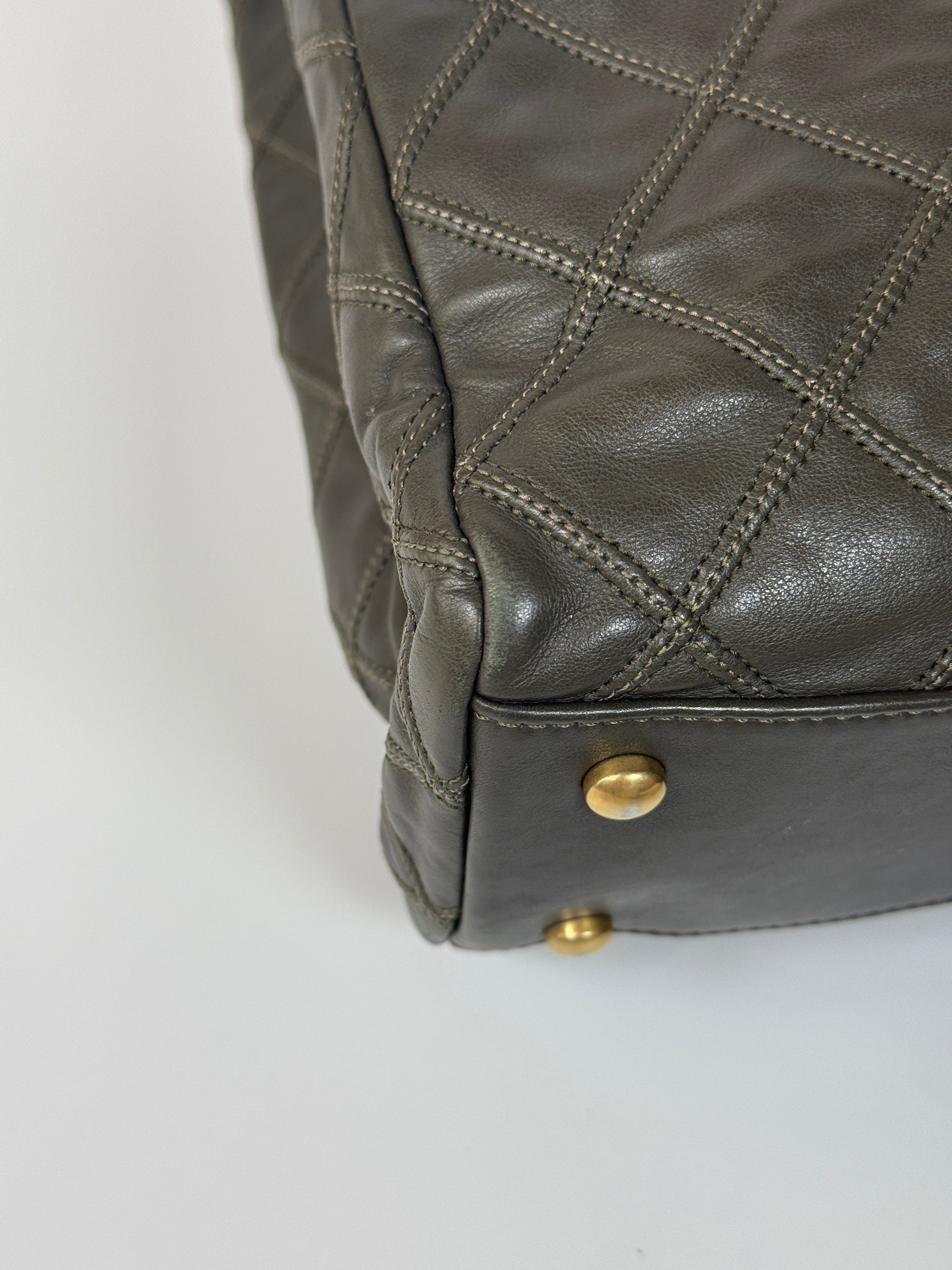 Authentic and preloved Chanel Dark Green Lambskin Leather Tote Bag With Gold Hardware very good condition. 100% Authenticity Guarantee