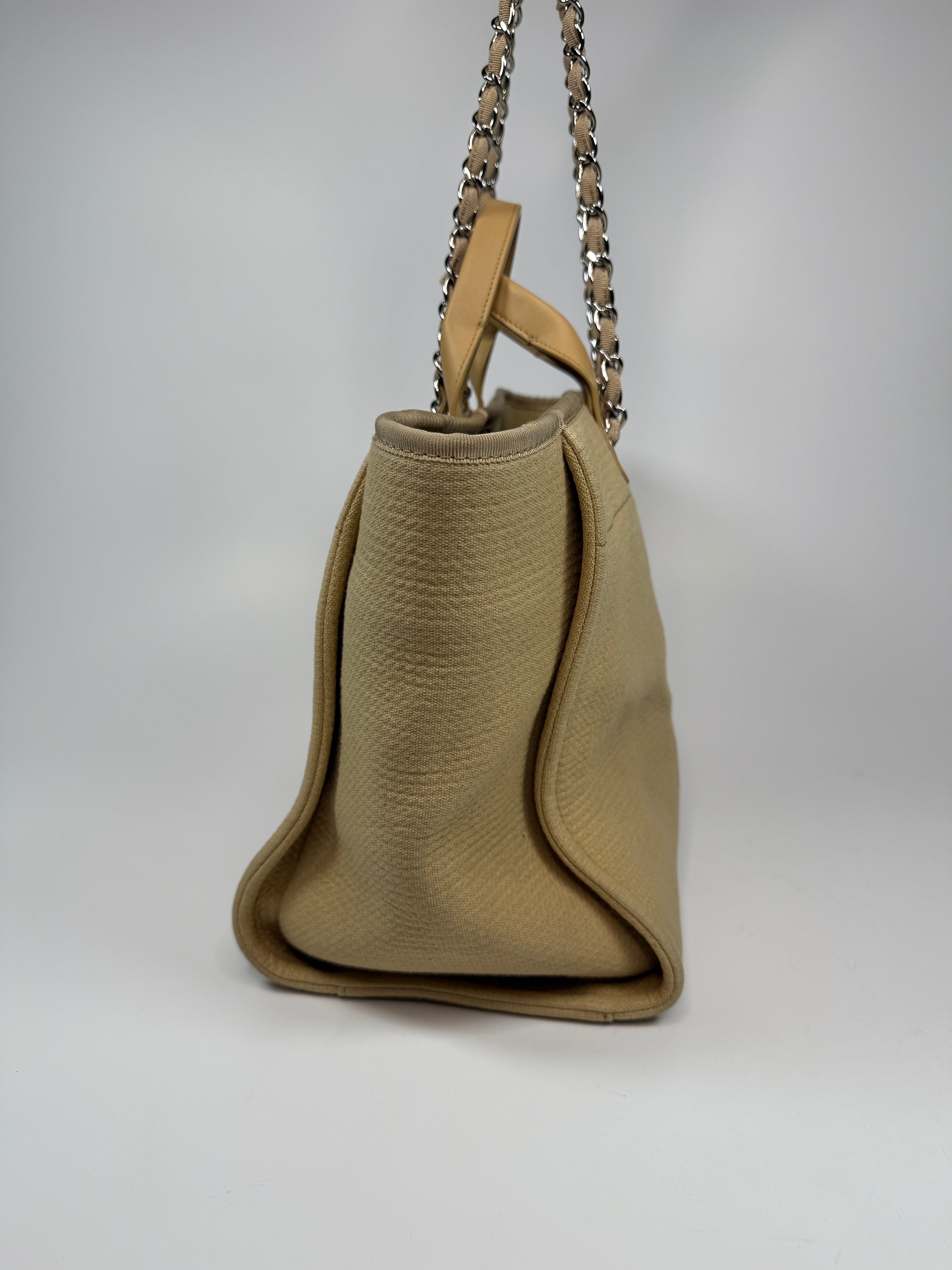 Chanel Large Deauville Tote Bag Large In Beige Fabric With Silver Hardware. Authentic and preloved In Very Good condition