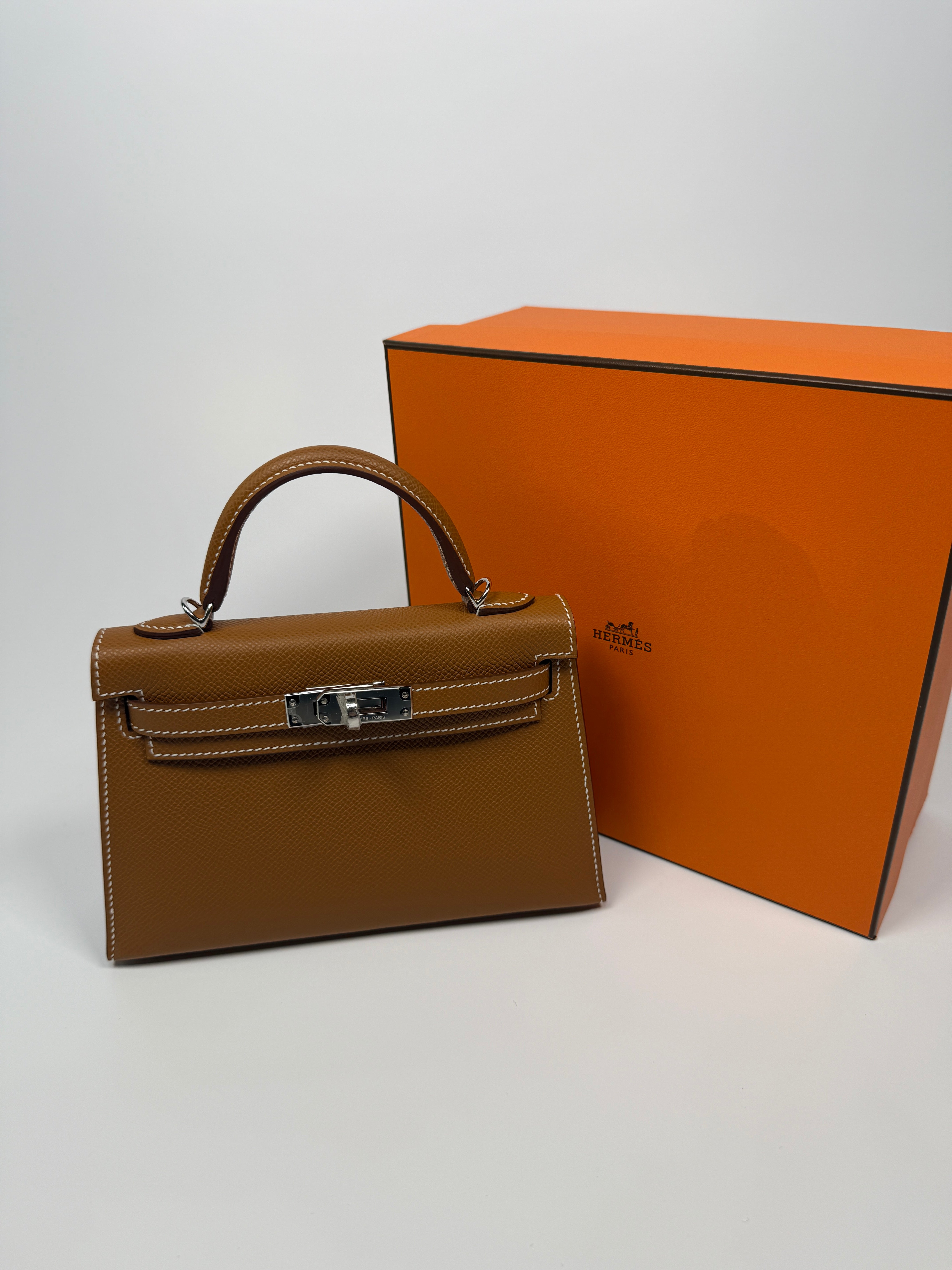 Hermès Mini Kelly Sellier In Gold Epsom Leather With Palladium Hardware New and unused Authentic and preloved