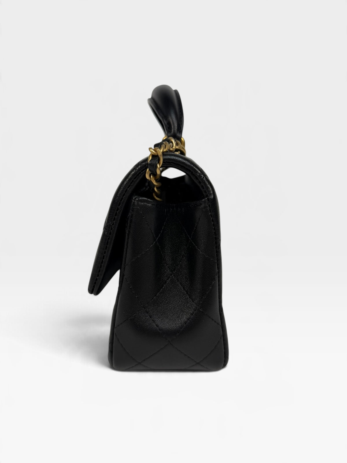 Chanel Mini Rectangle Top Handle In Black Lambskin With Gold Hardware. 100% authentic and pre loved in excellent condition.