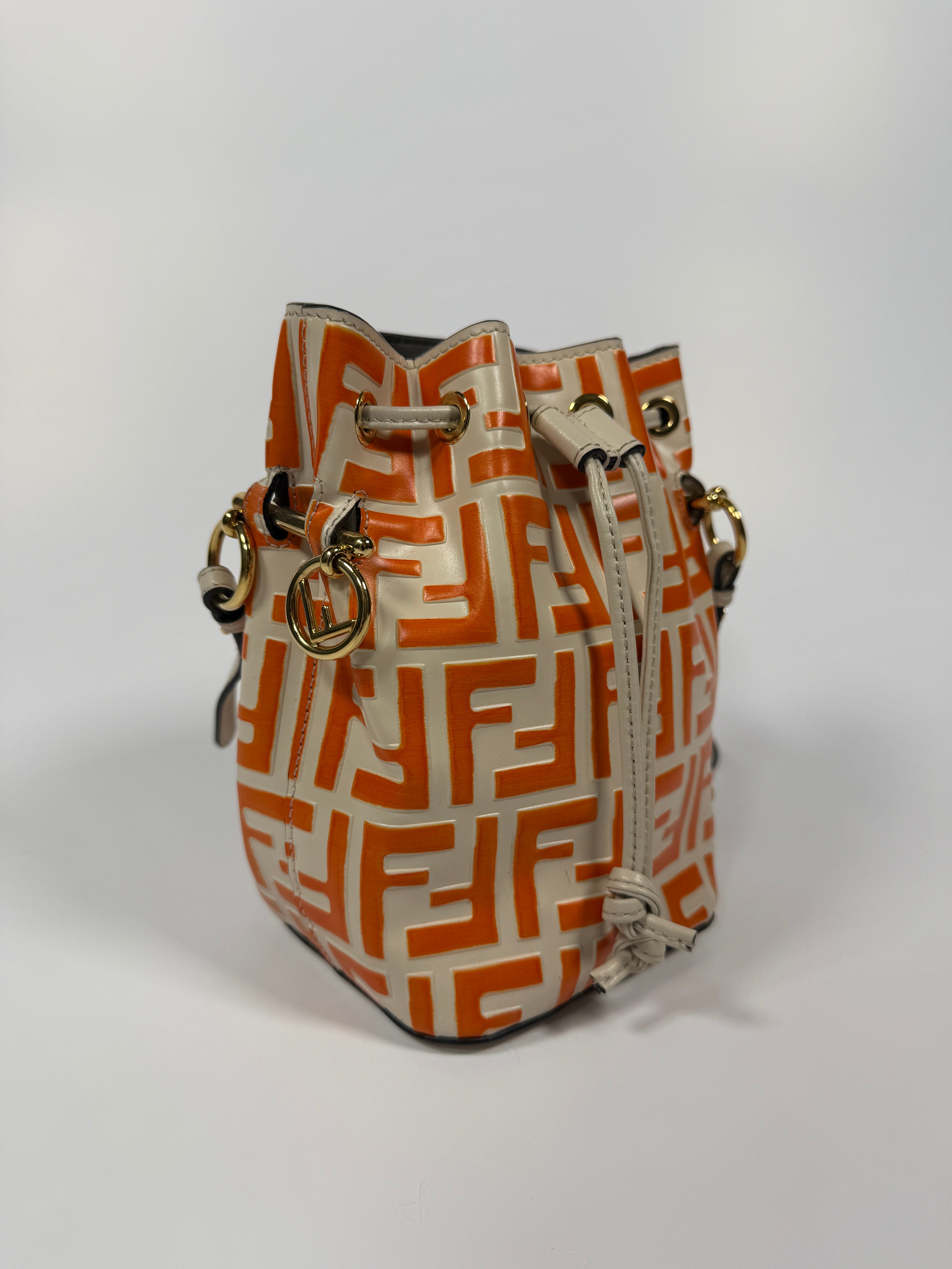 Authentic and pre loved Fendi Mini Mon Tresor Bucket Bag orange In Very Good Condition