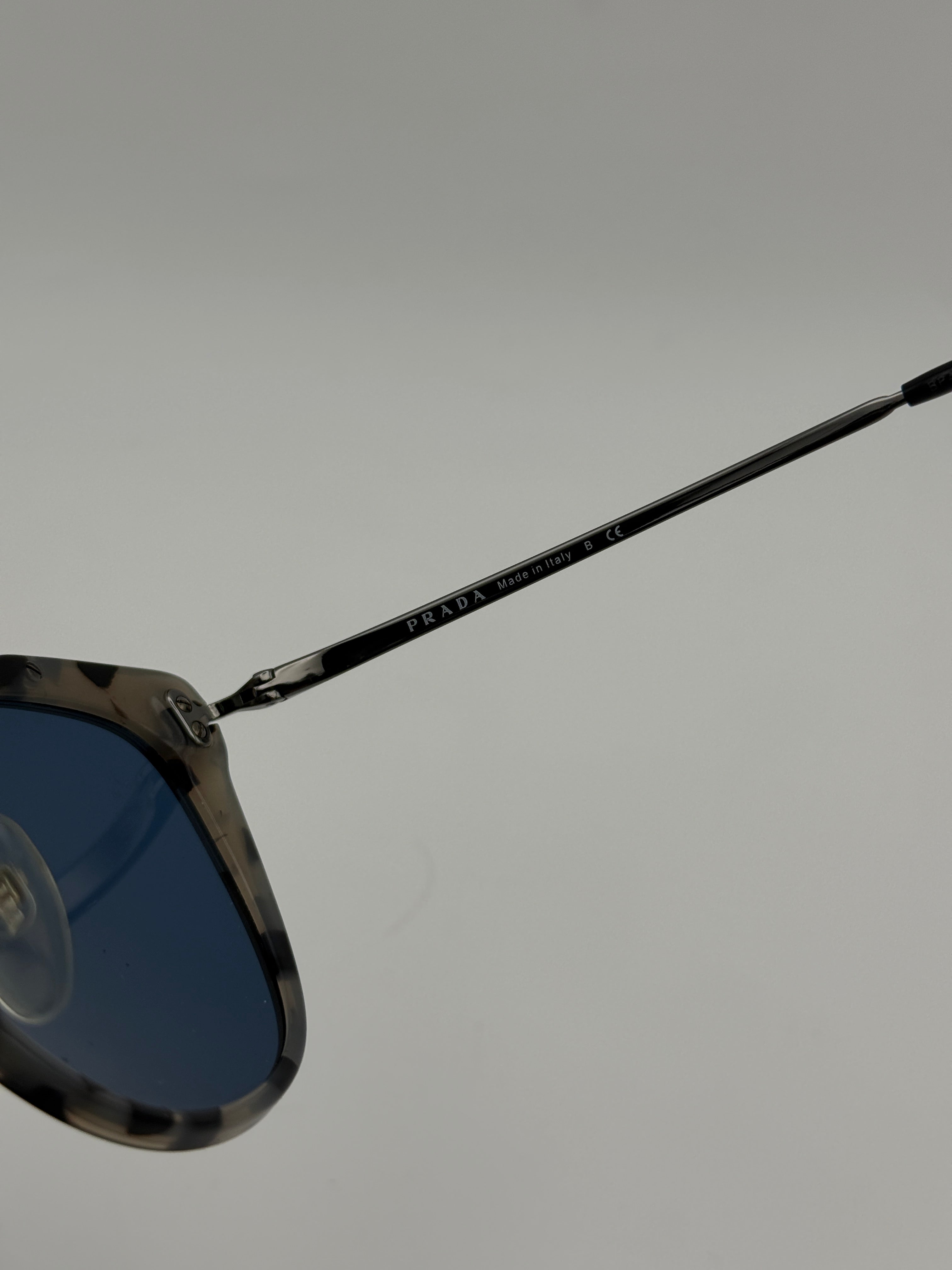 Prada SPR 20U sunglasses. 100% Authenticity guarantee. verified by Luxe Cheshire