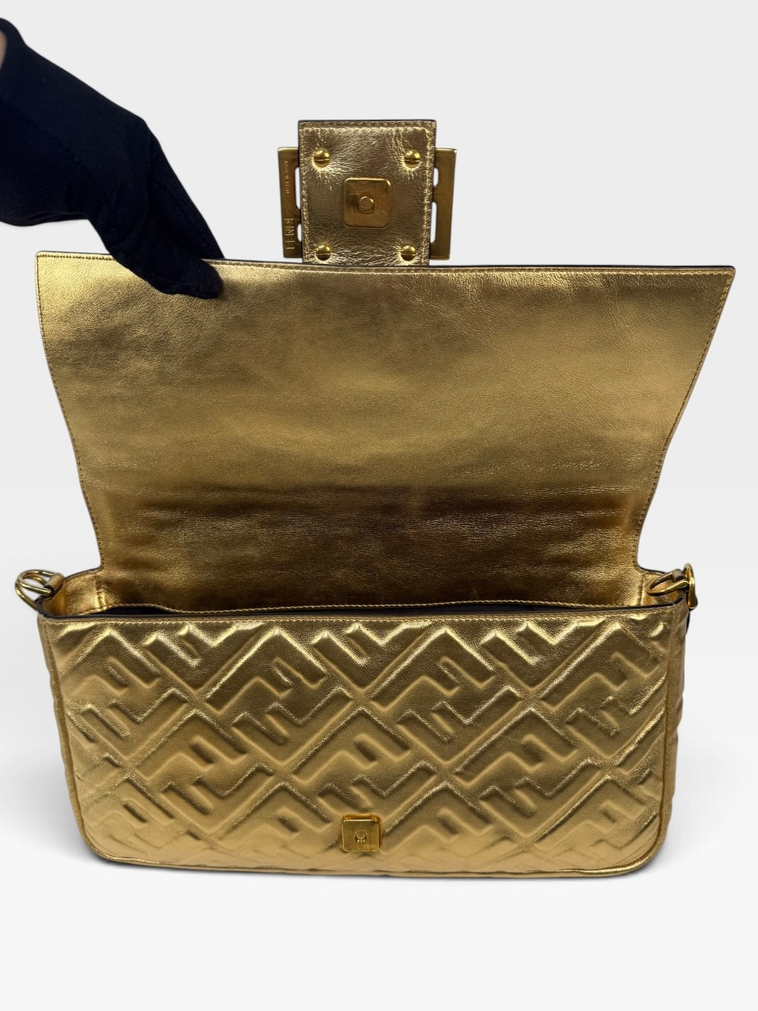 Fendi Large Baguette In Gold Leather Monogram With Gold Hardware. 100% authentic and preloved in excellent condition