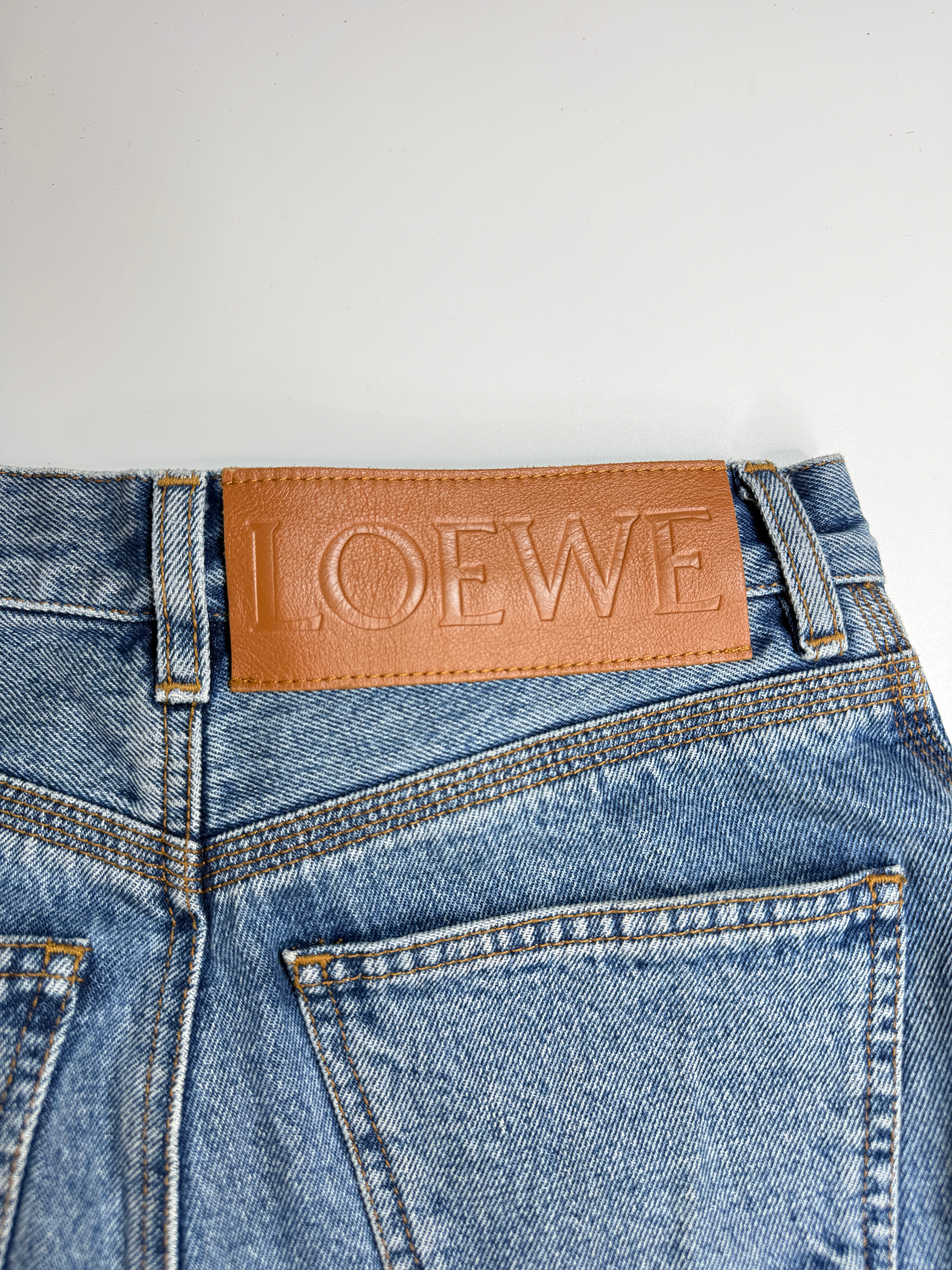 Authentic and preloved Loewe Anagram Denim Jeans (Size 36/UK8) In Blue Denim. Excellent Condition. Fully Insured next day delivery. Verified by Luxe Cheshire.