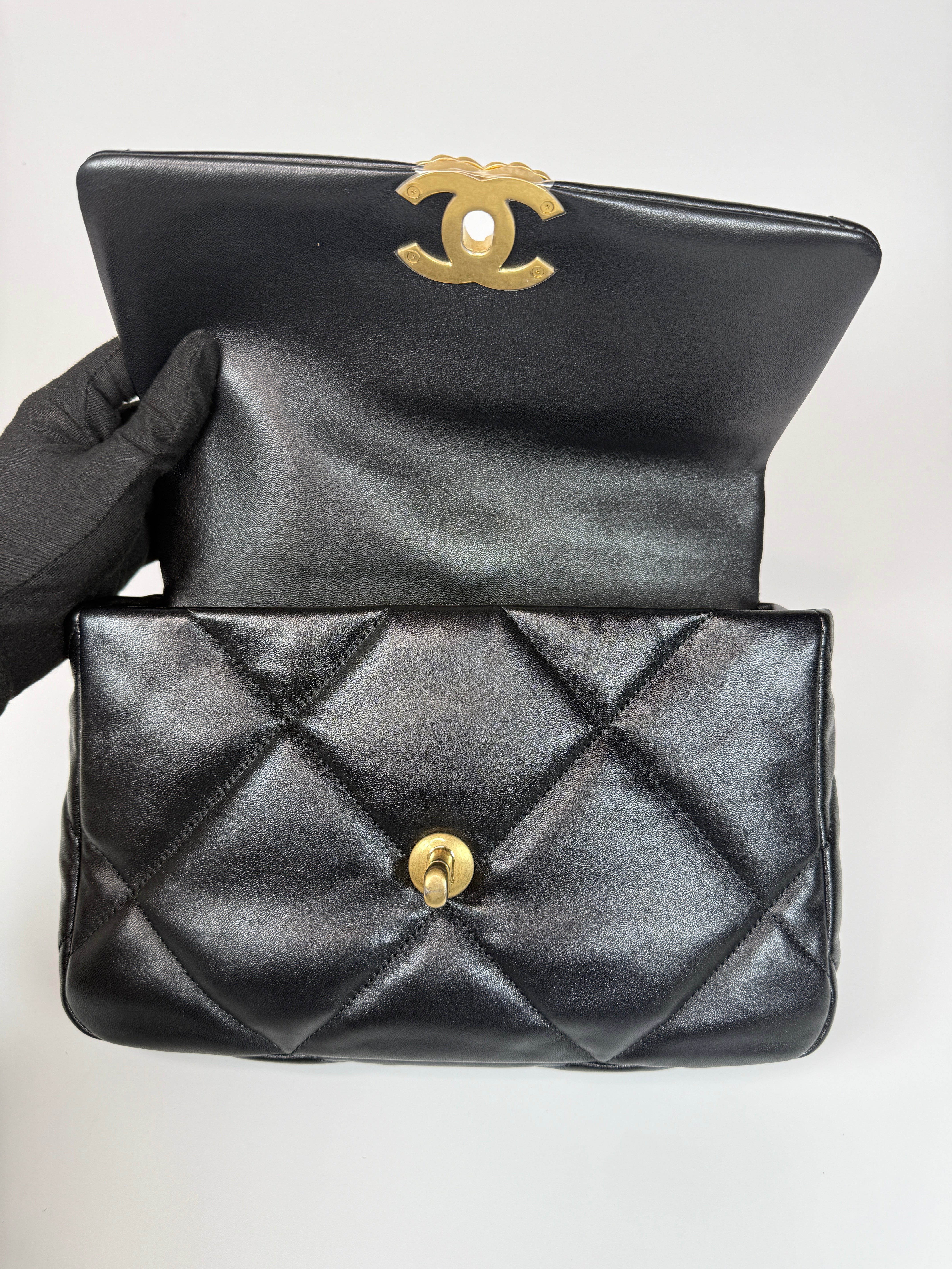 Authentic and preloved Chanel 19 Small In Black Lambskin Leather Mixed hardware. Excellent condition. 100% Authenticity guarantee