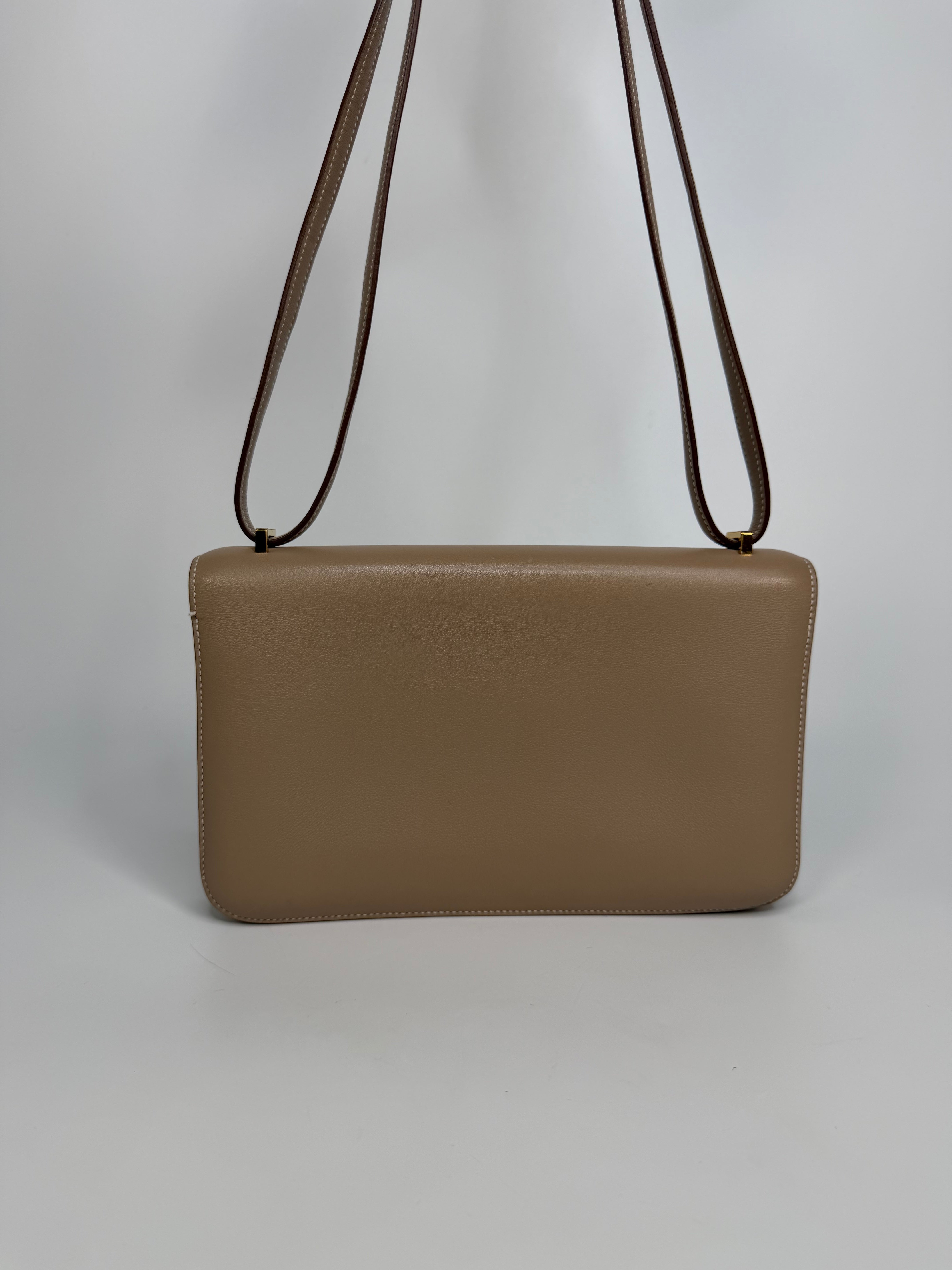 Hermès Constance Elan In Trench Swift Leather With Gold Hardware. Authentic and preloved in very good condition