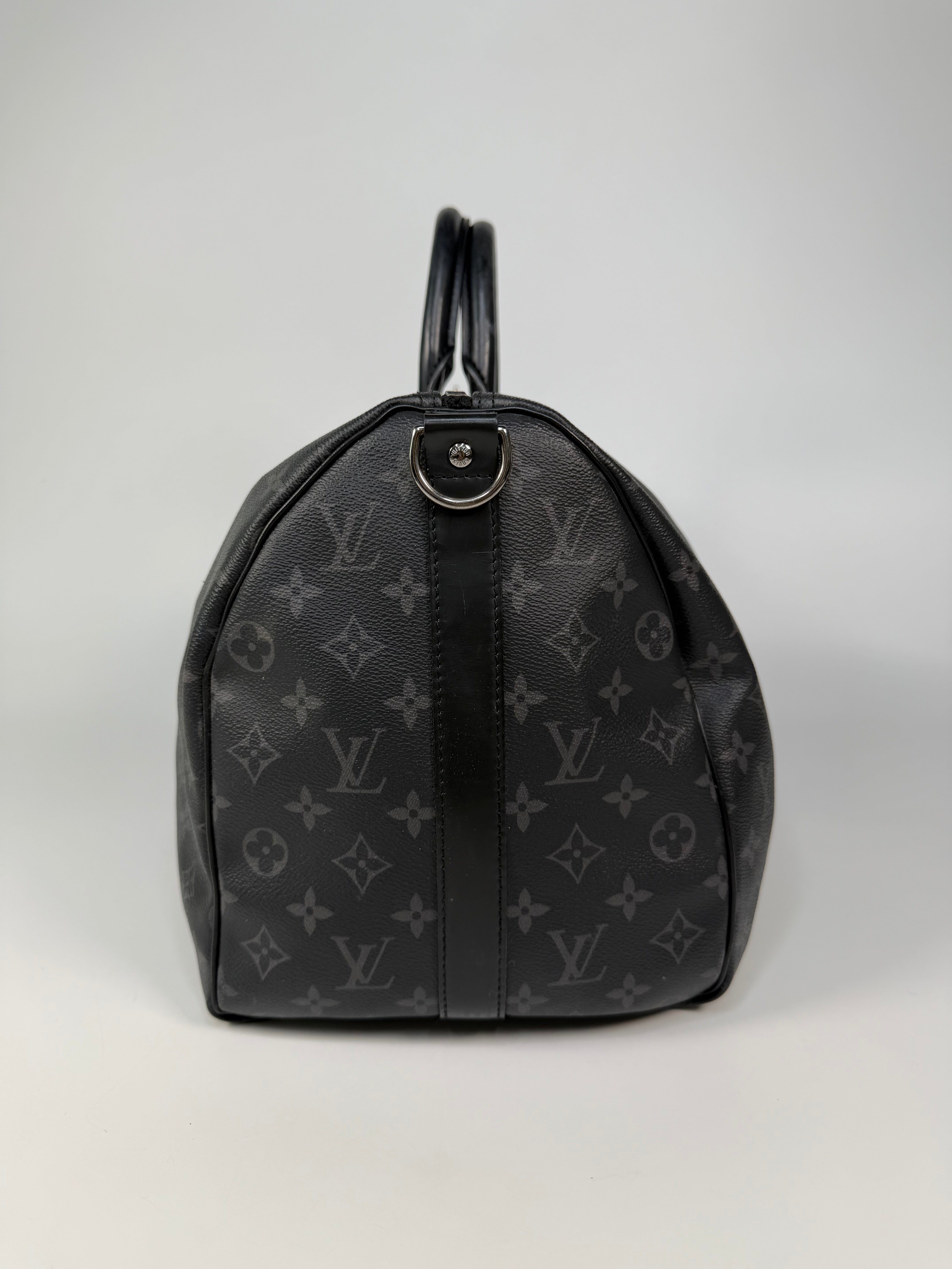 Louis Vuitton Keepall Bandouliere 45 Monogram Eclipse Canvas. 100% authentic and preloved in excellent condition.