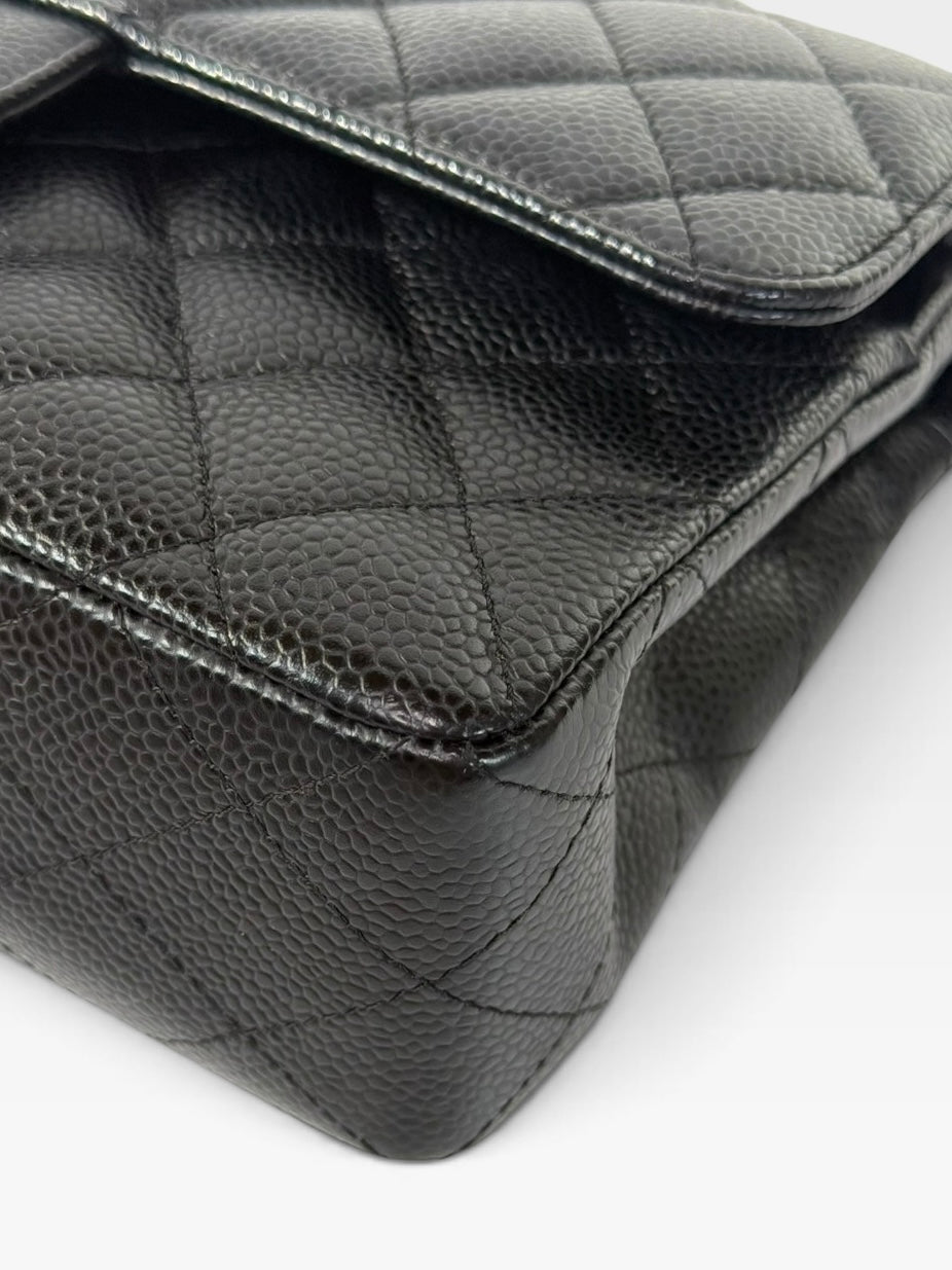 Chanel Vintage Small Classic Double Flap In Black Caviar Leather With Silver Hardware. 100% authentic and preloved in excellent condition